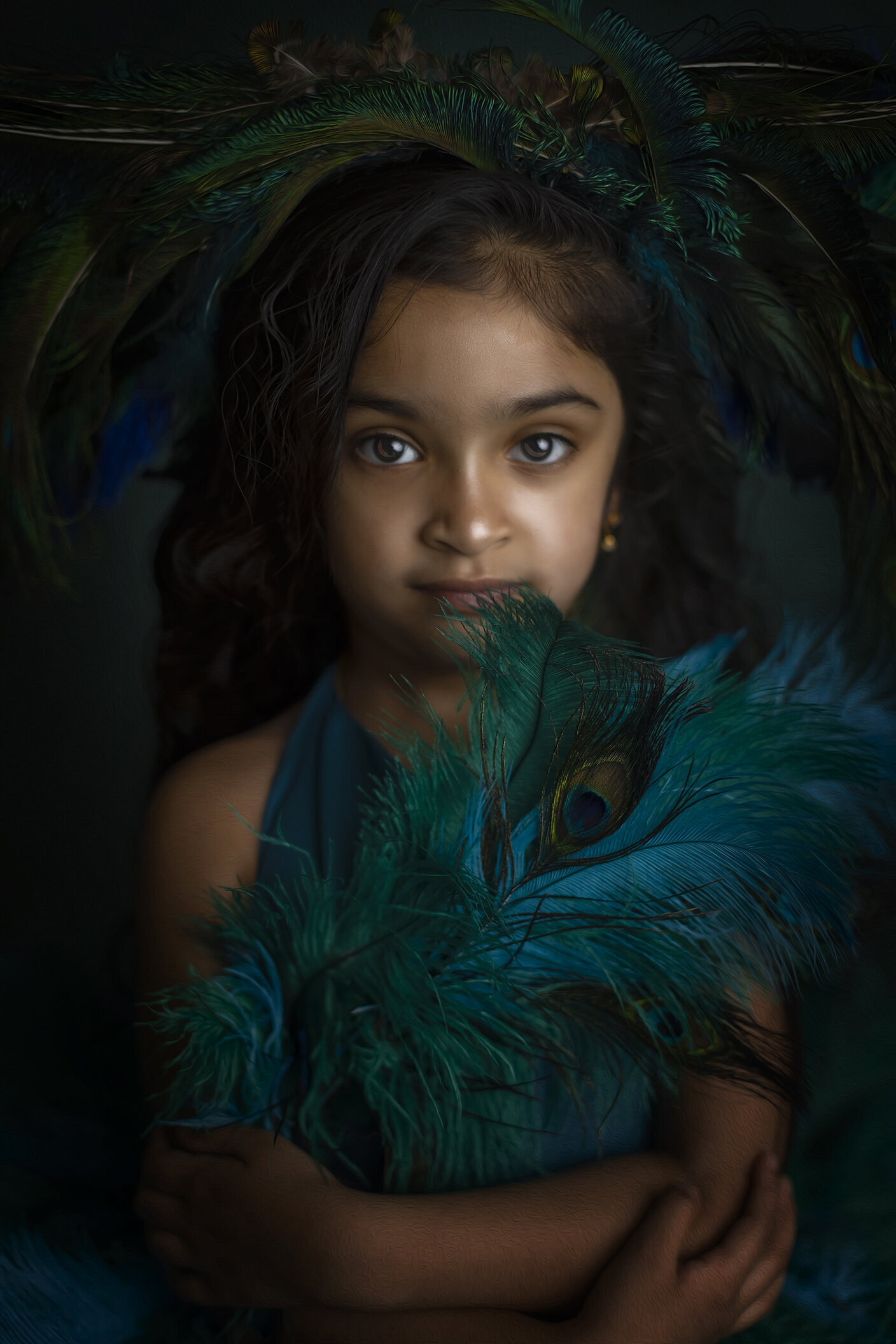 Girl in beautiful peacock dress, a Dallas children’s photographer.