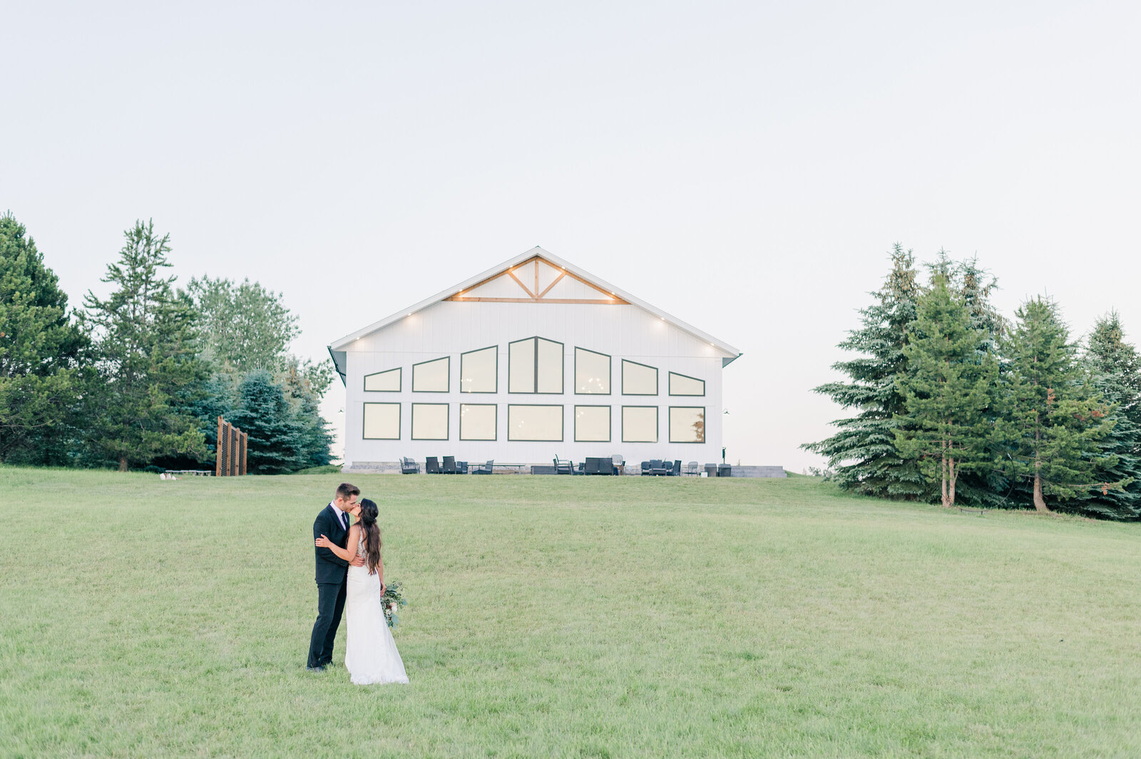 Tin Roof Event Centre Lacombe Alberta Bride and Groom Portraits