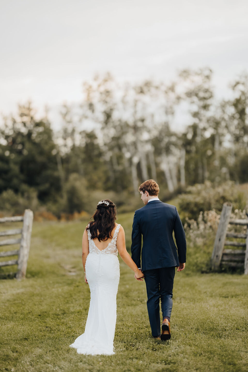 Bride and groom walking away