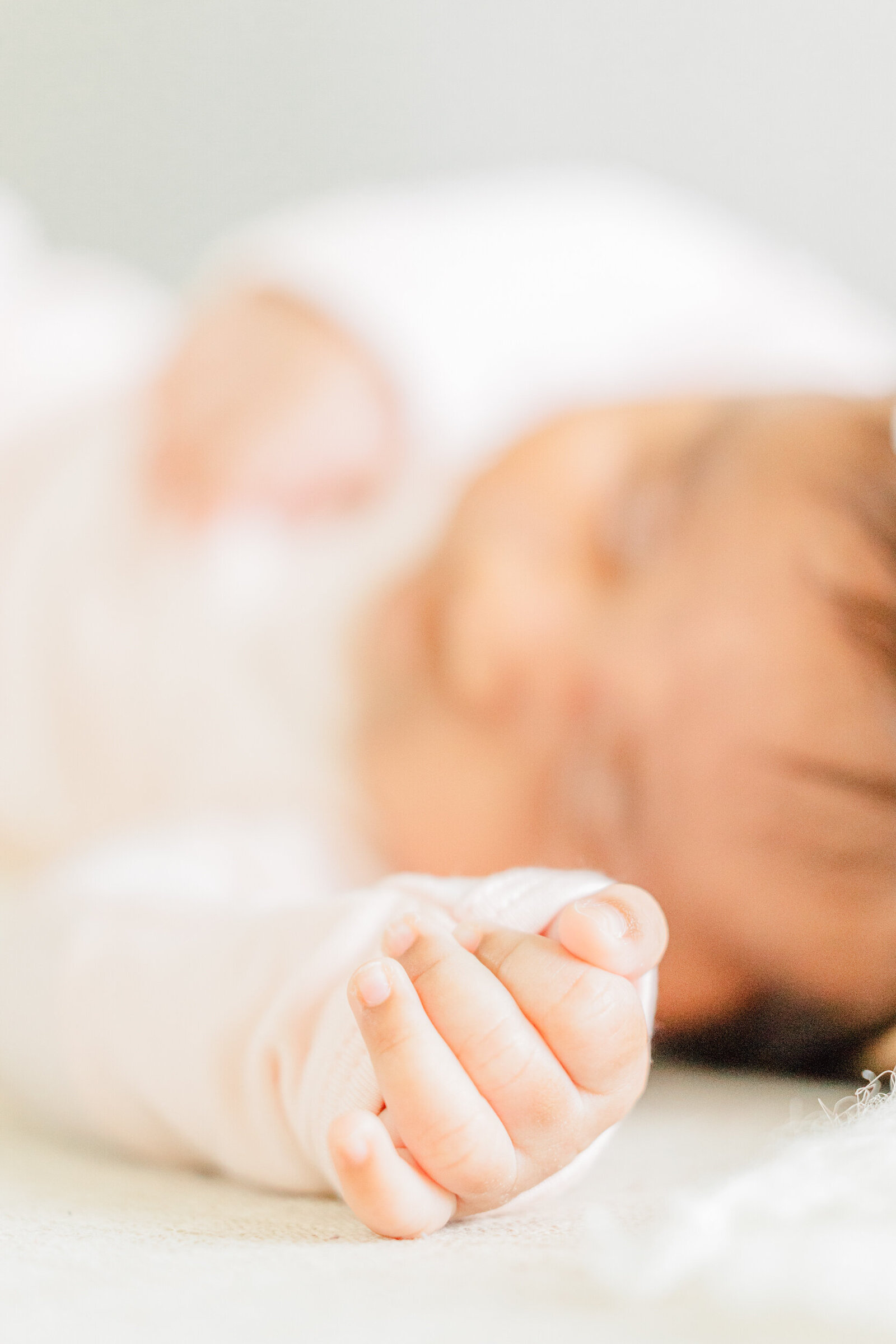 Close-up detail of sleeping newborn hand