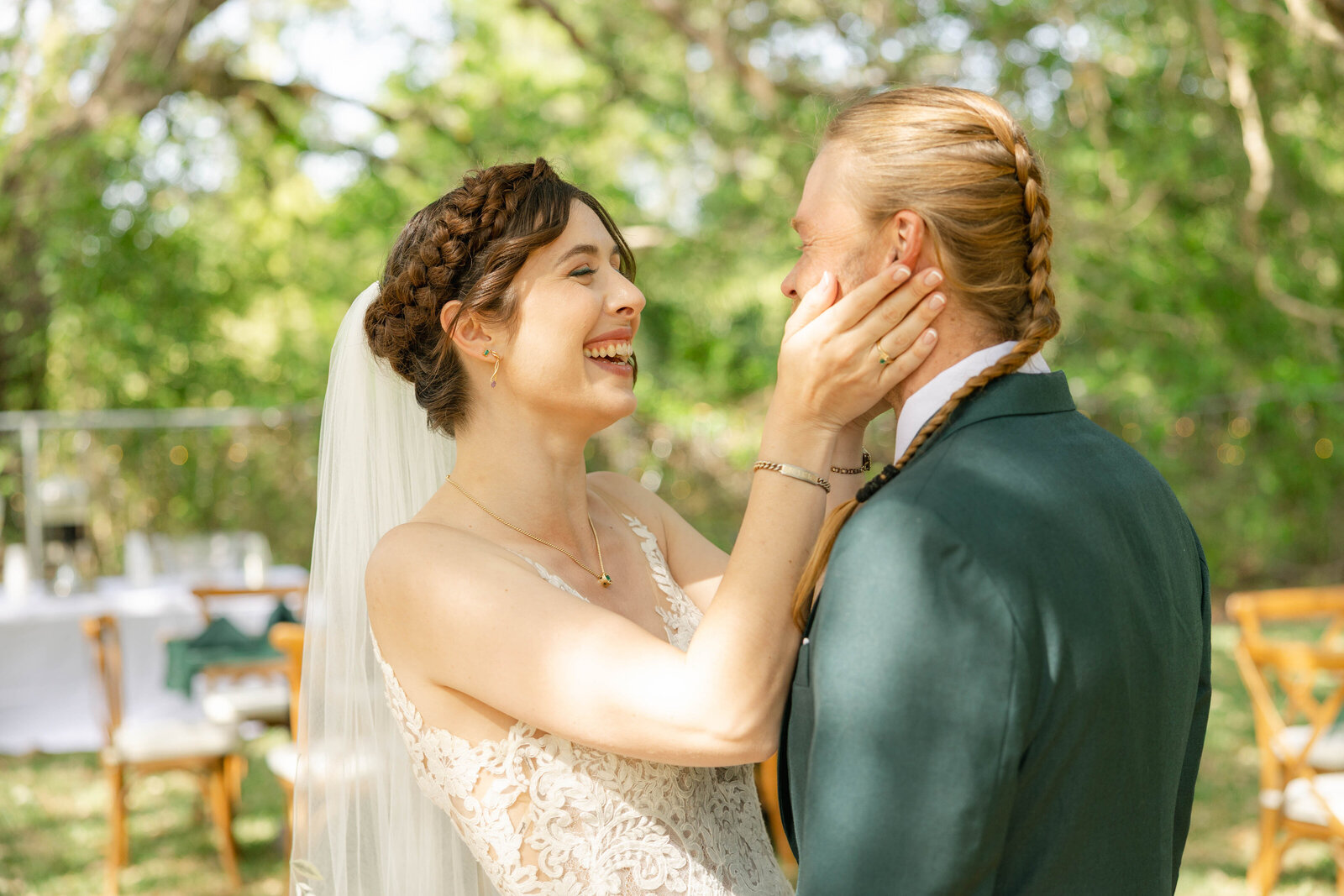 Candid bride fixing her groom's tie on their wedding day, captured by wedding photographer in Sarasota FL