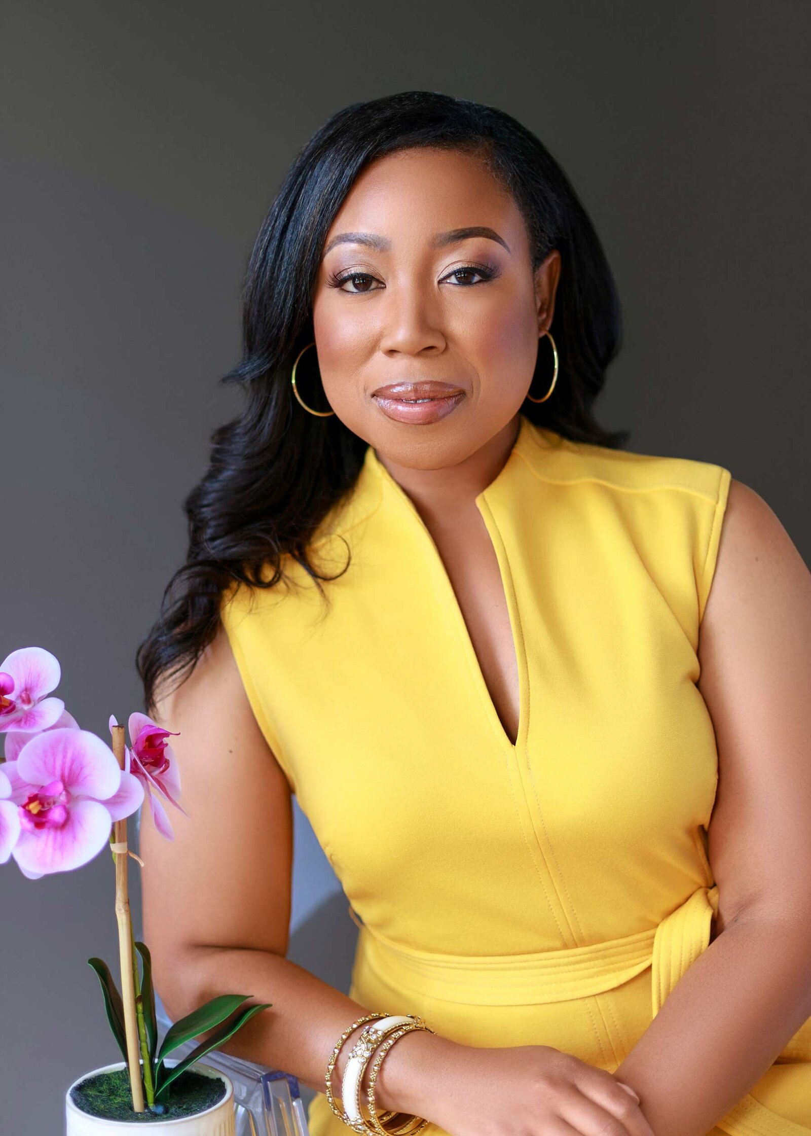 Atlanta Black Woman Entrepreneur Posing for Bold Color Headshot
