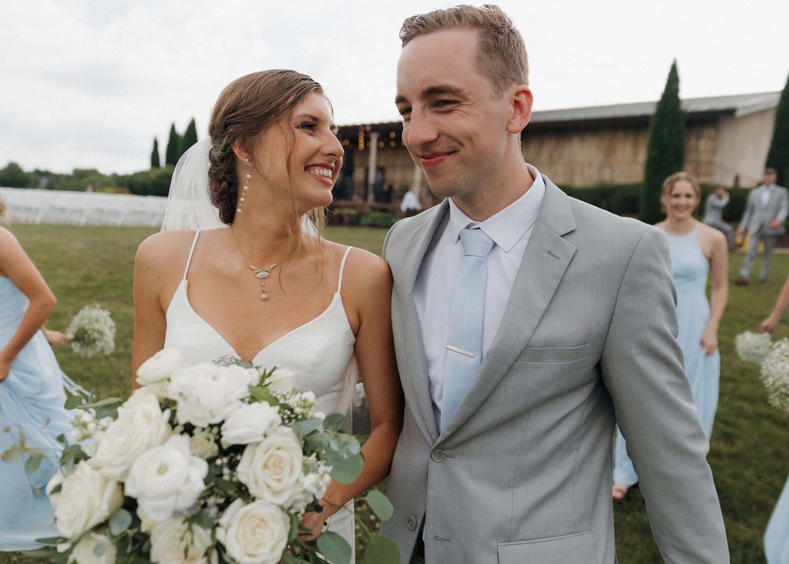grace-trexel-photo-bride-groom-smiling-outside-nebraska-wedding