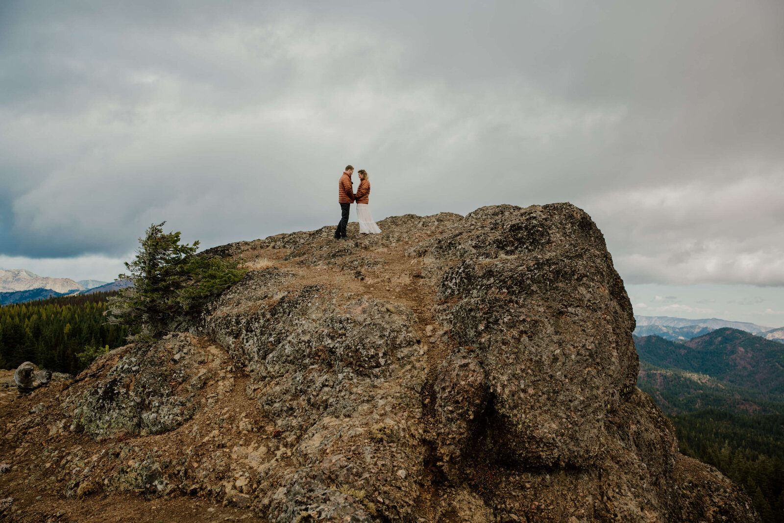 Bride and Groom on Cascade mountain top ledge.