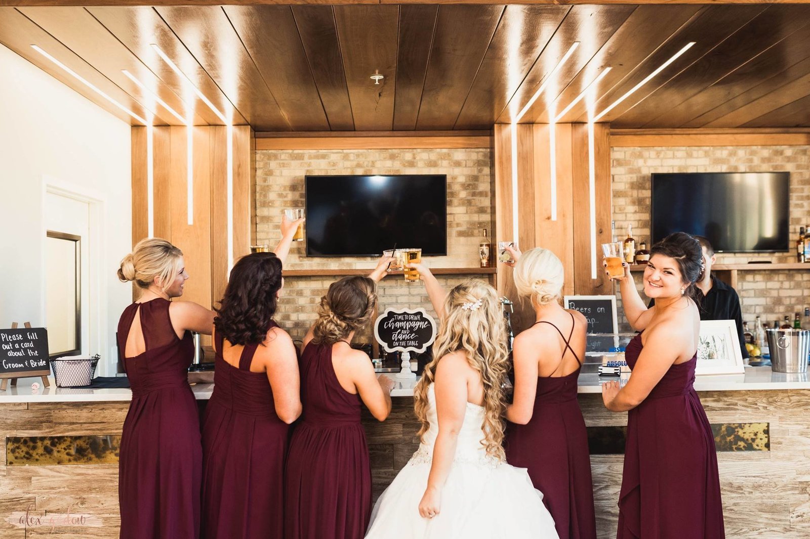 Bride toasting her bridesmaids
