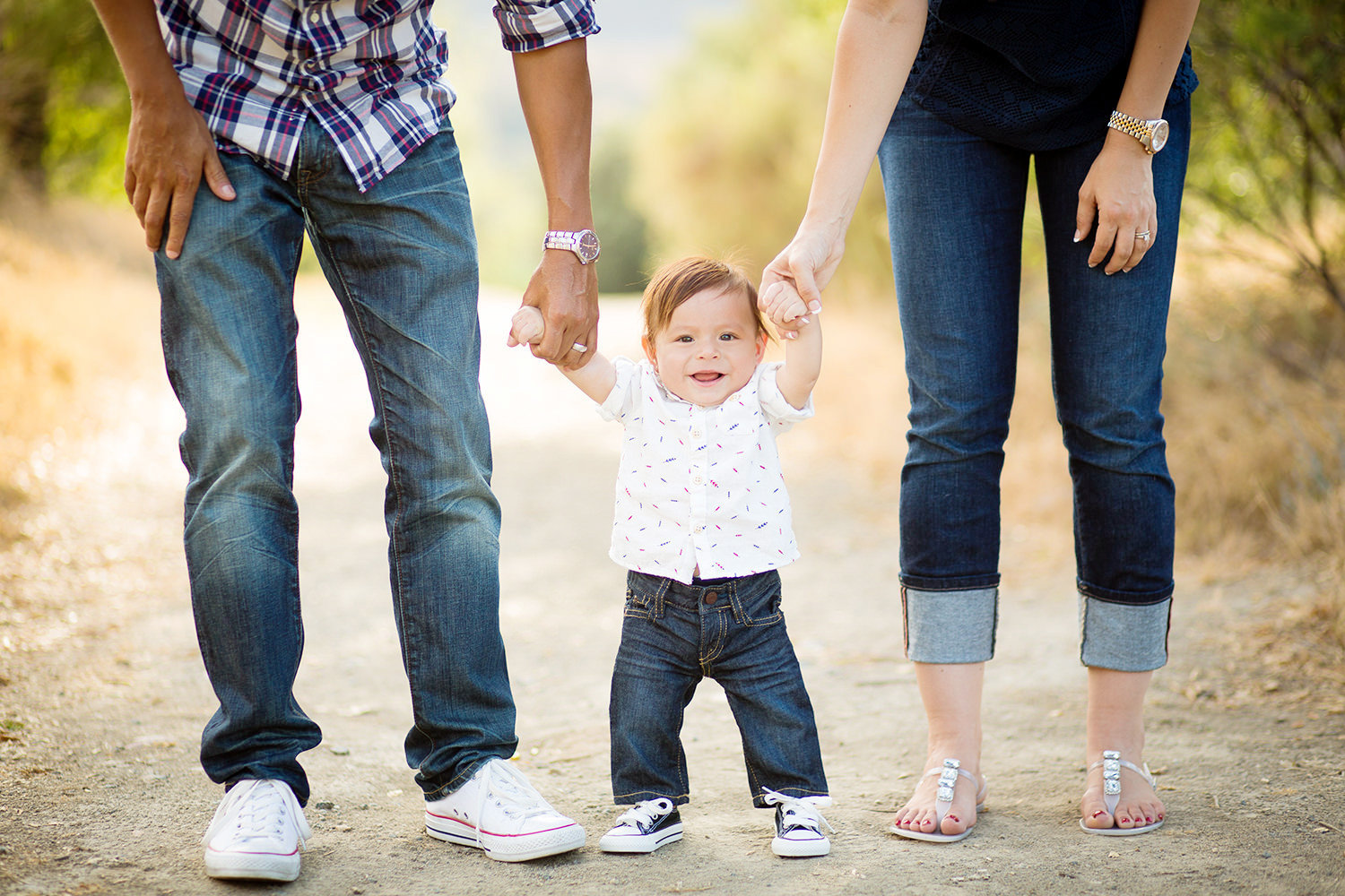 san diego family photography | mom and dad walking with little boy holding hands