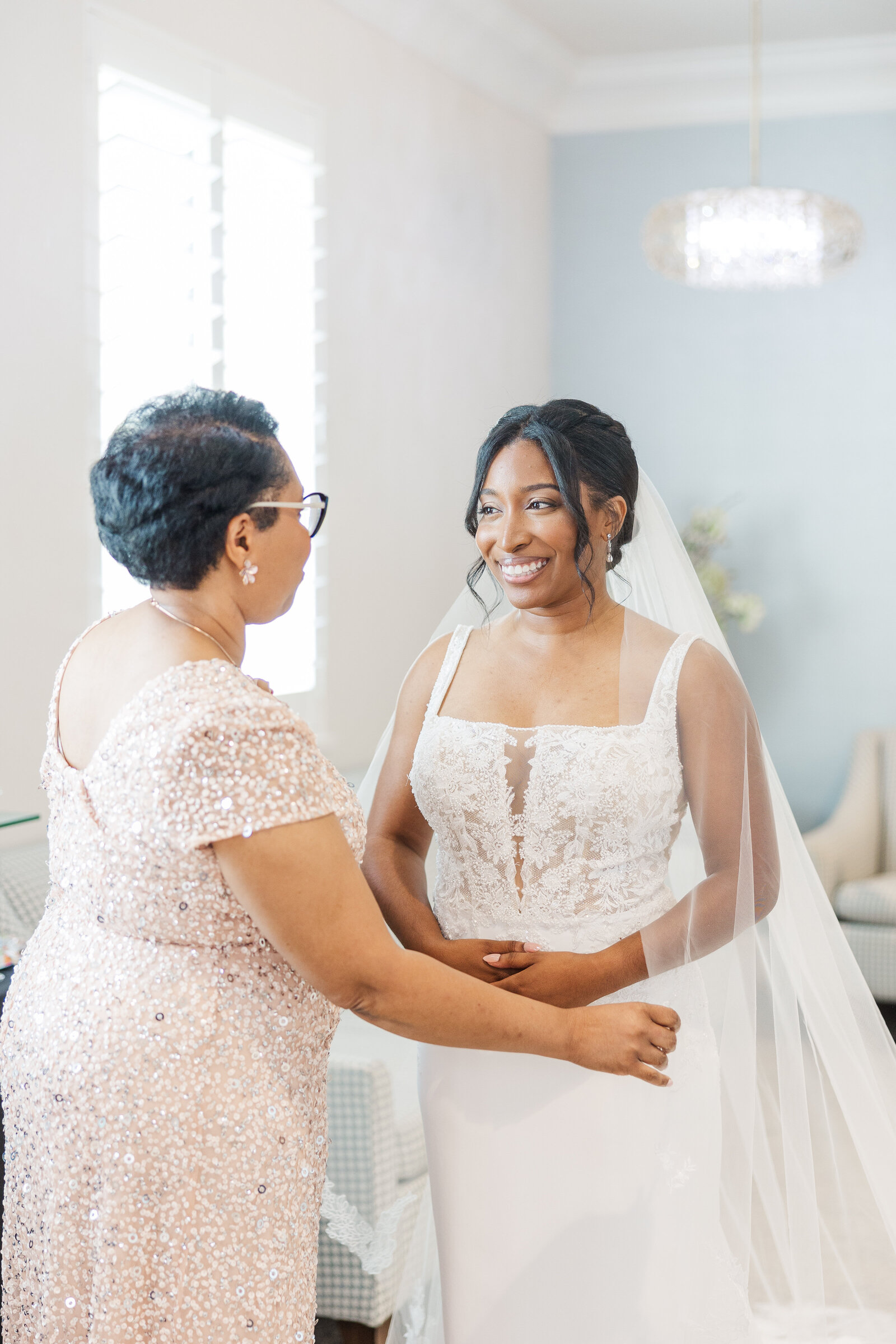 Bride and her mother in bridal suite pre wedding