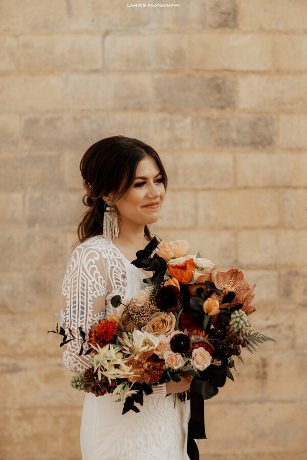 Asymmetrical bridal bouquet with unexpected color pairings and sculptural form, perfect for the nontraditional Dallas bride.