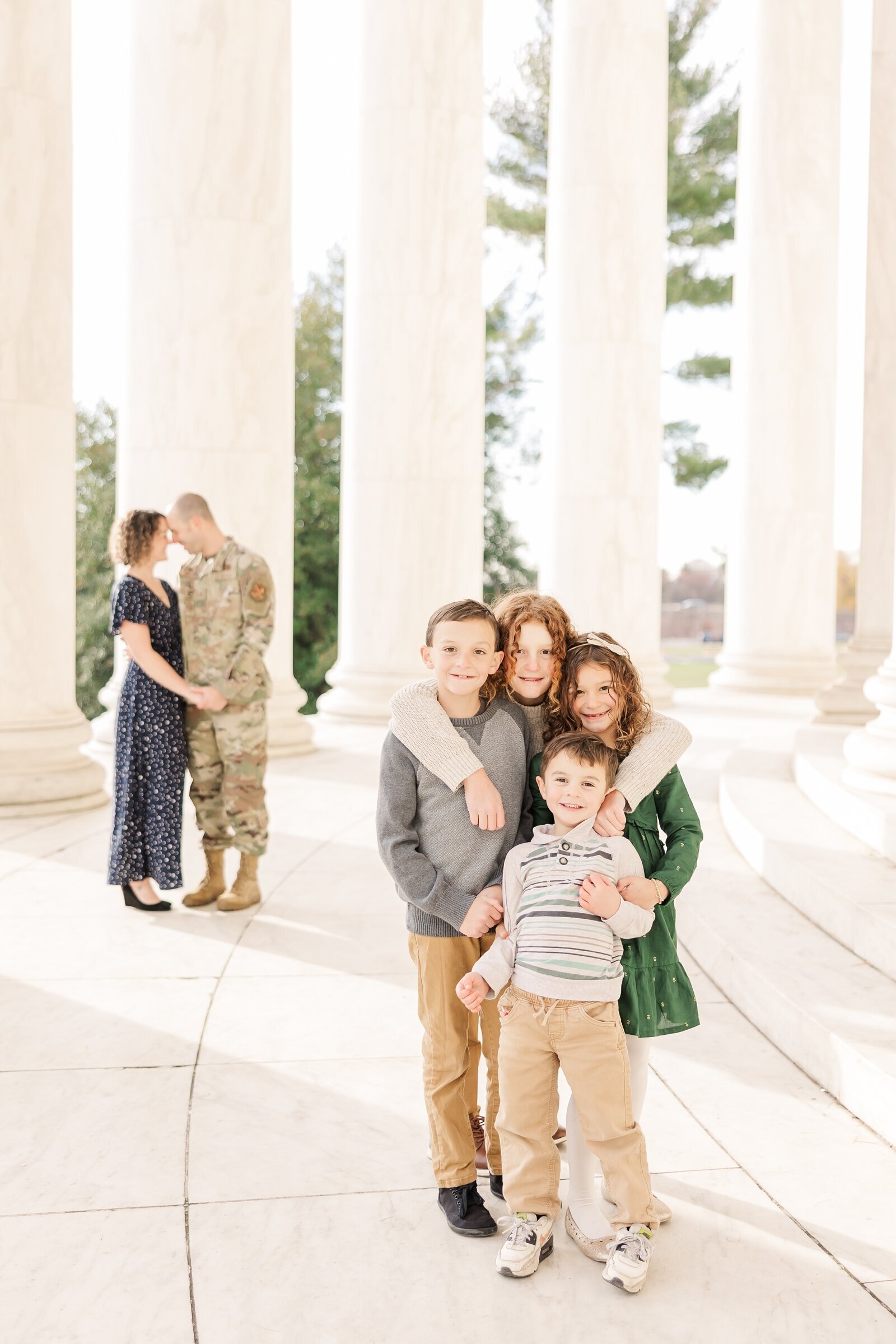 Military family photo at the Jefferson Memorial