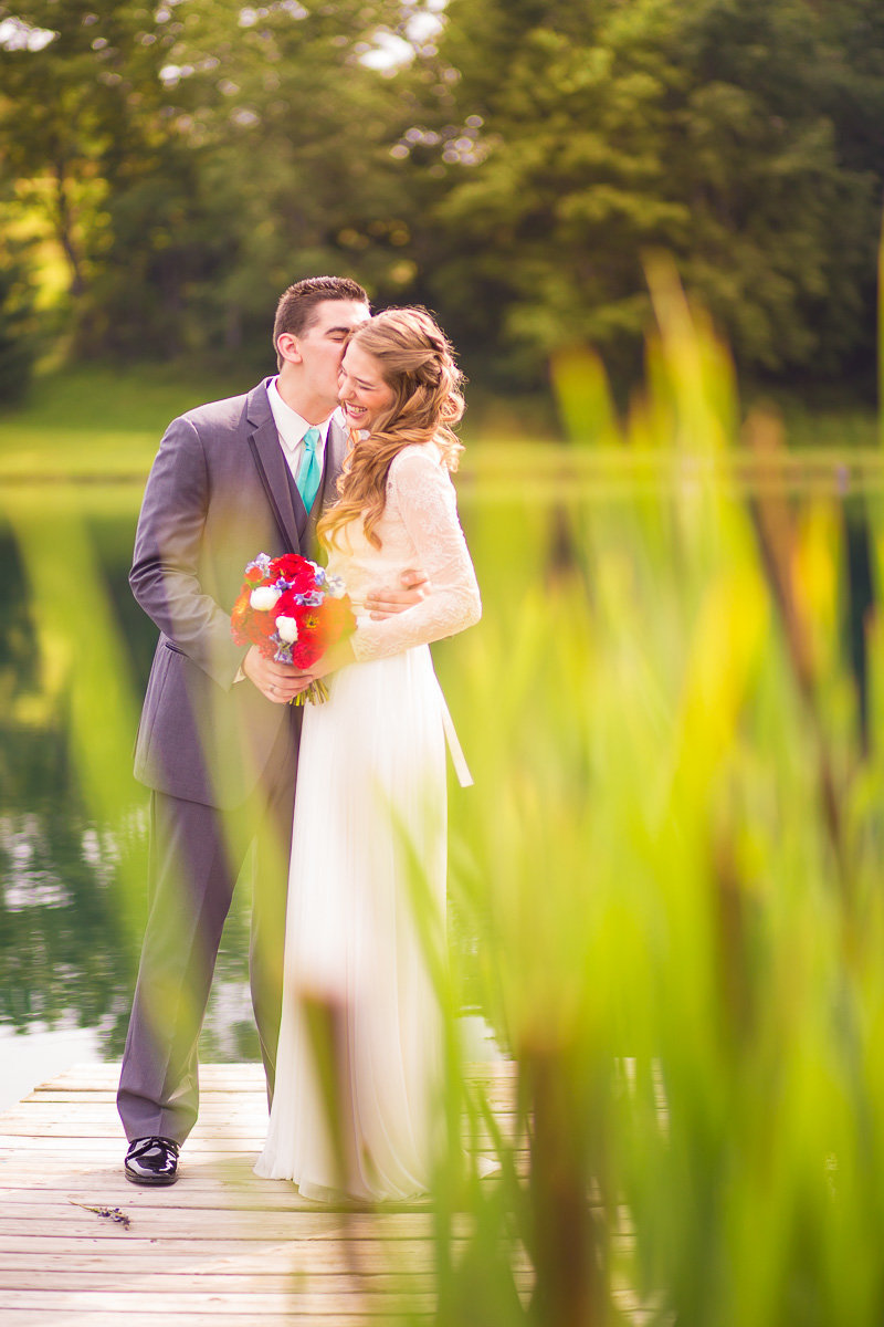 candid image of a wedding couple by husband and wife wedding photographers in md.