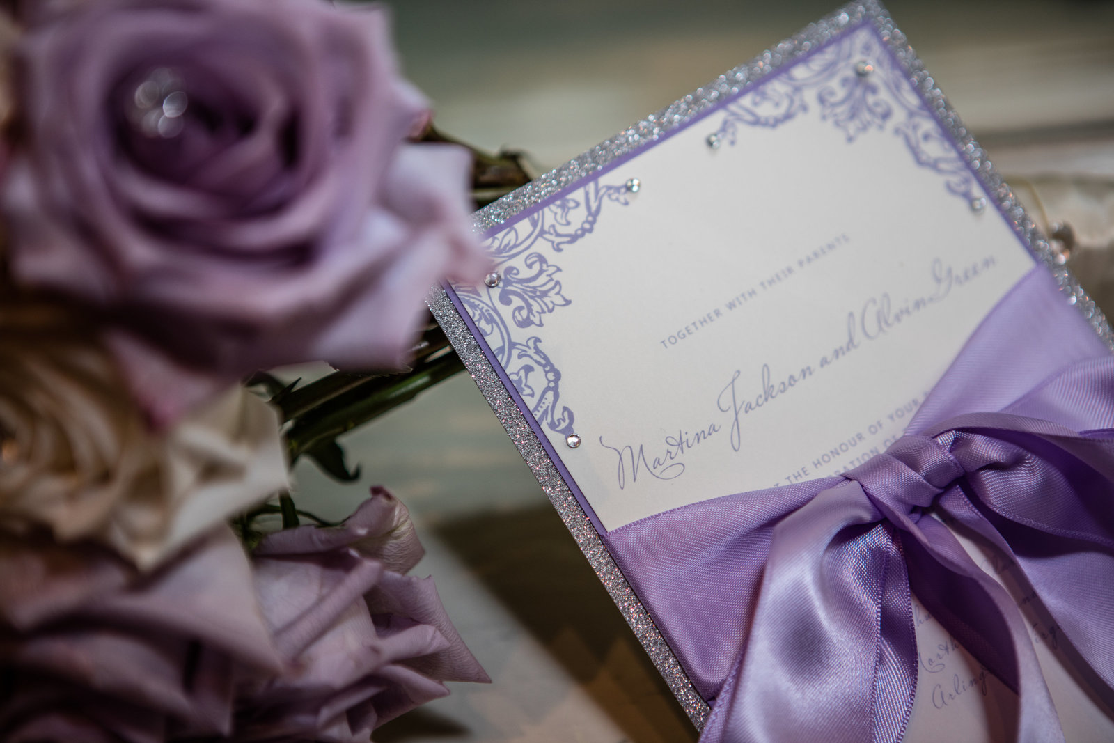 Bouquet and wedding invitation
