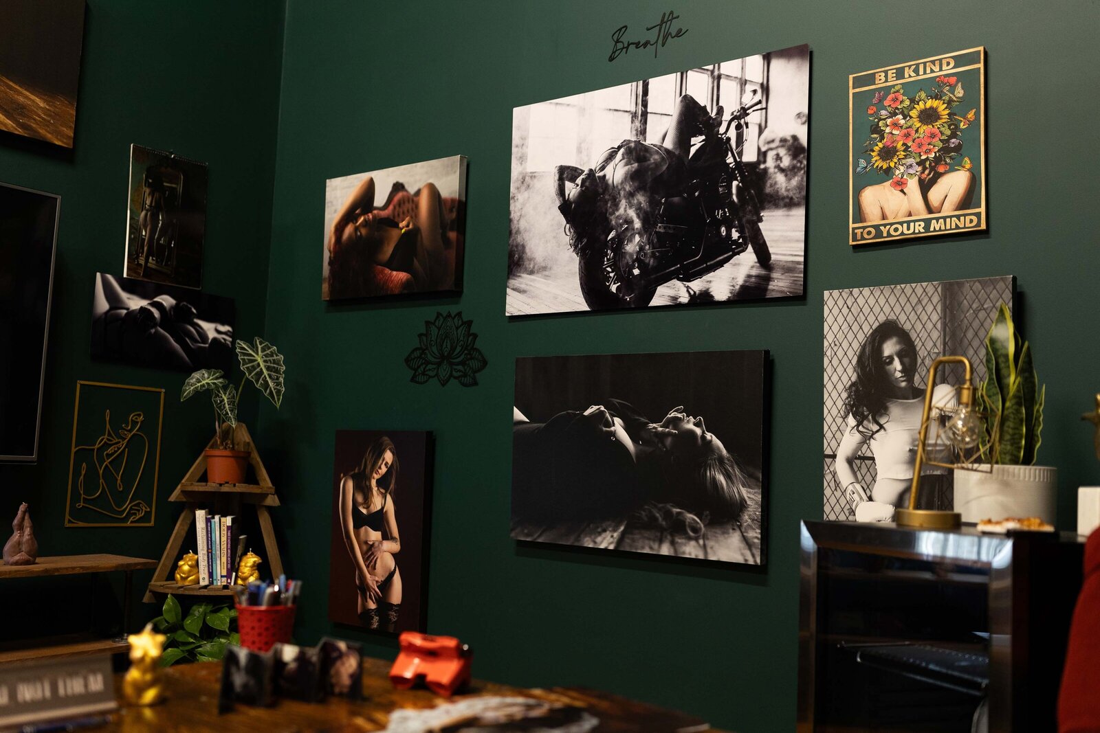 green wall of painting in stories untold studio