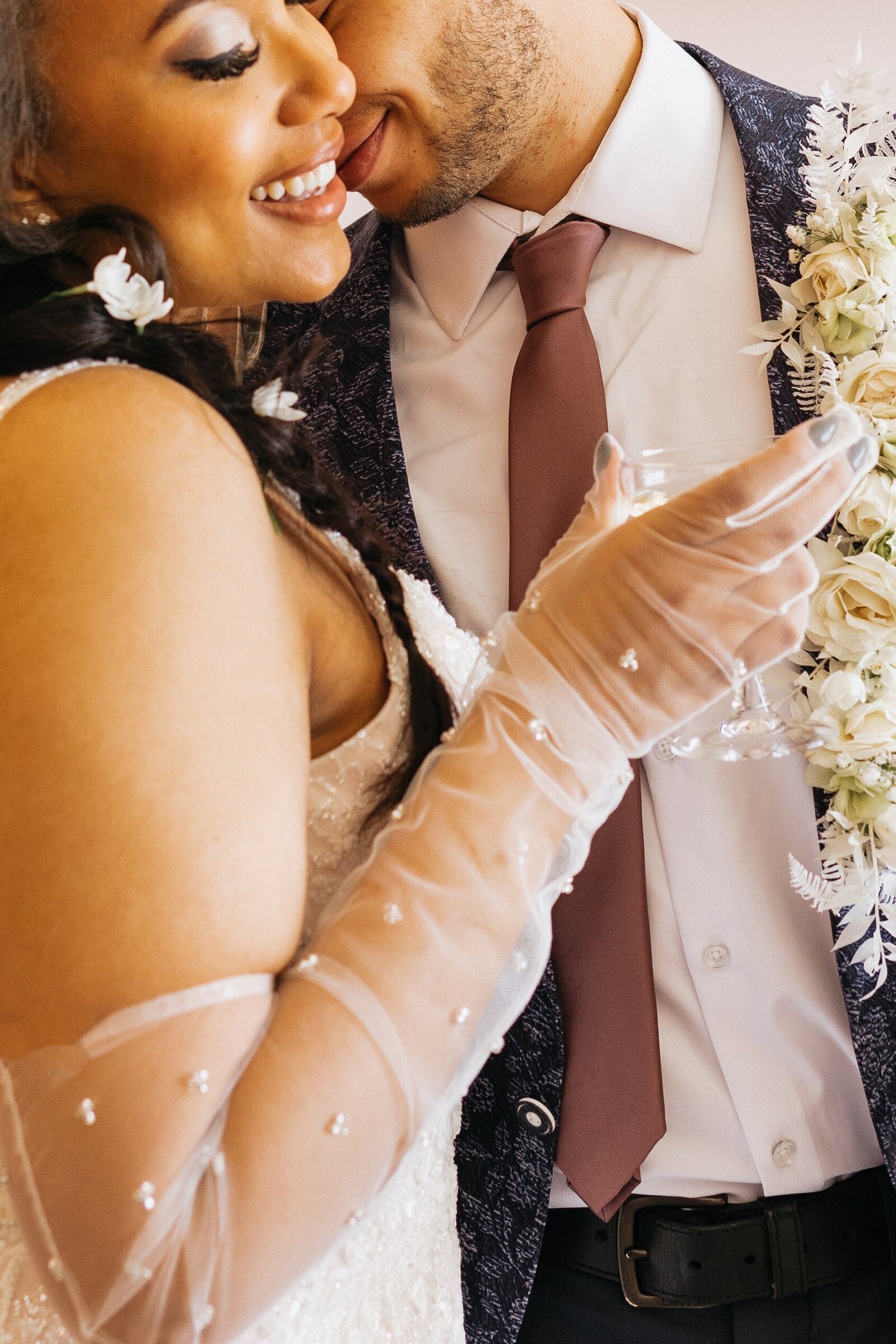 Couple embraces at their wedding.