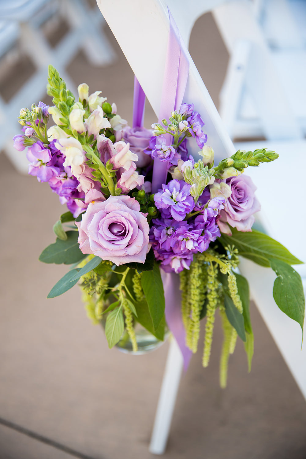 beautiful purple white and pink ceremony flowers