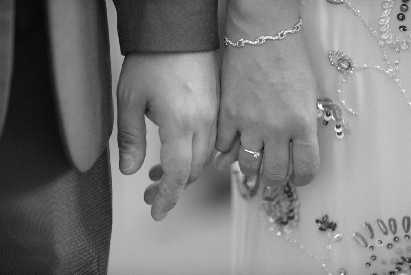 Wedding couple hands linking