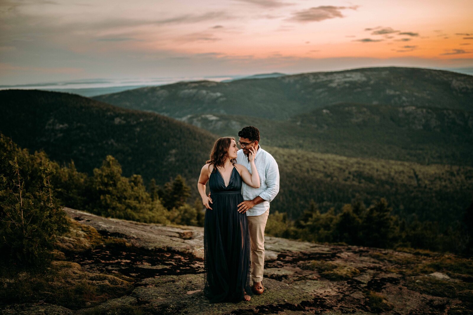 couple with mountain backdrop for engagement photos