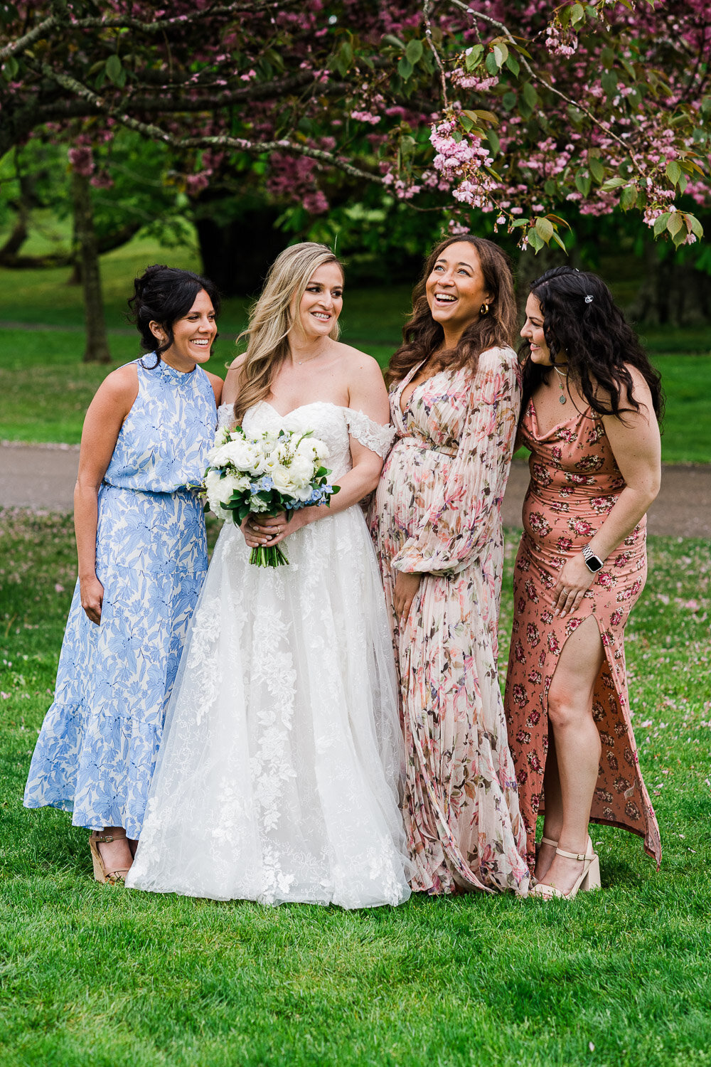 bride and bridesmaids laugh