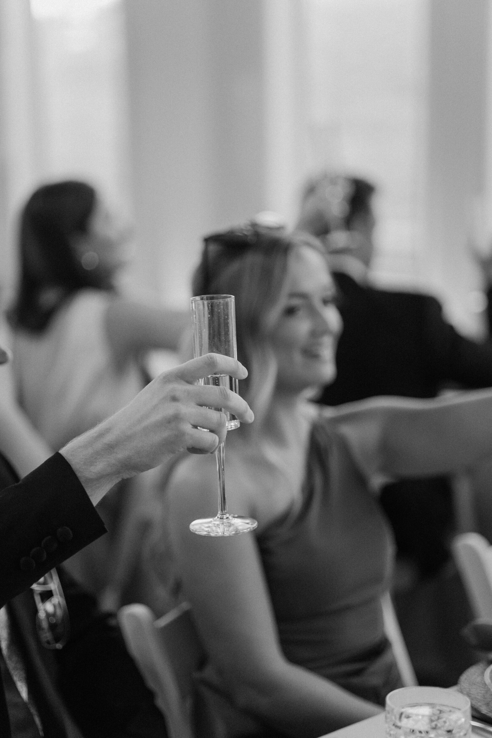 guest raising a glass