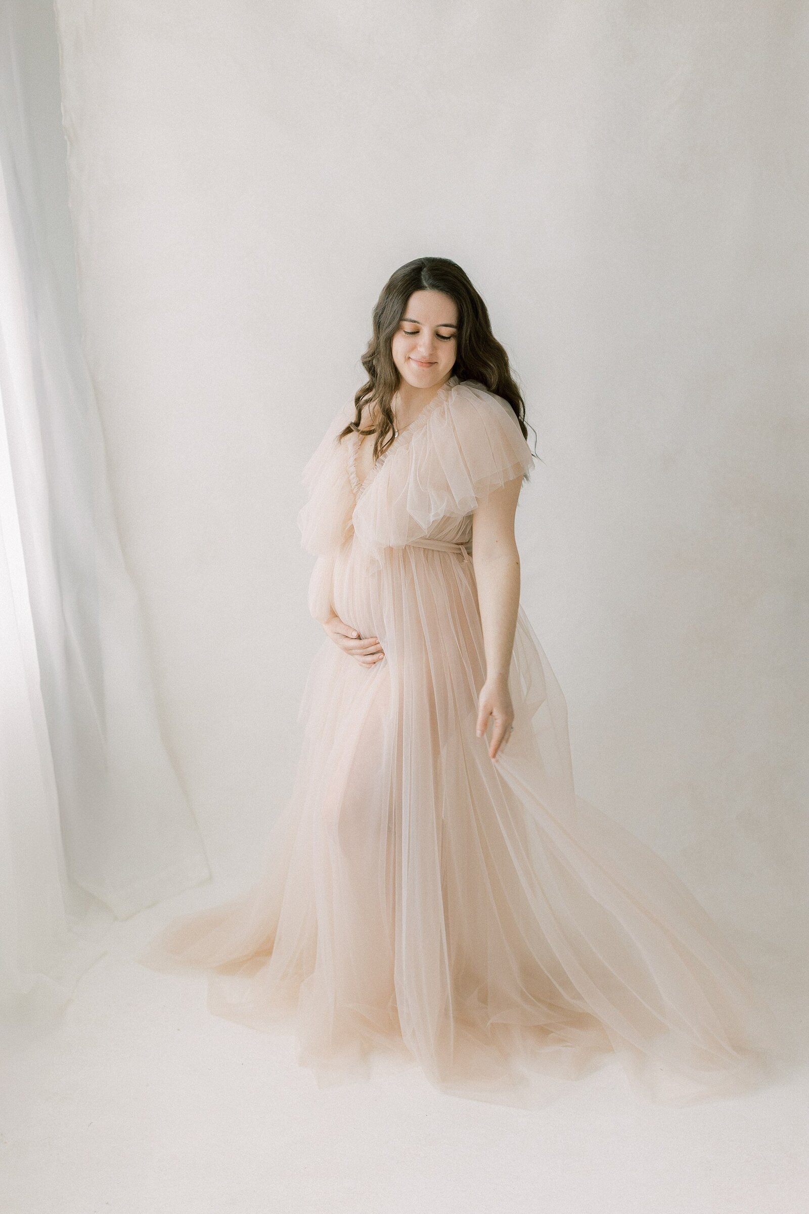 intimate maternity session in Lancaster, PA with tulle dresses and lace