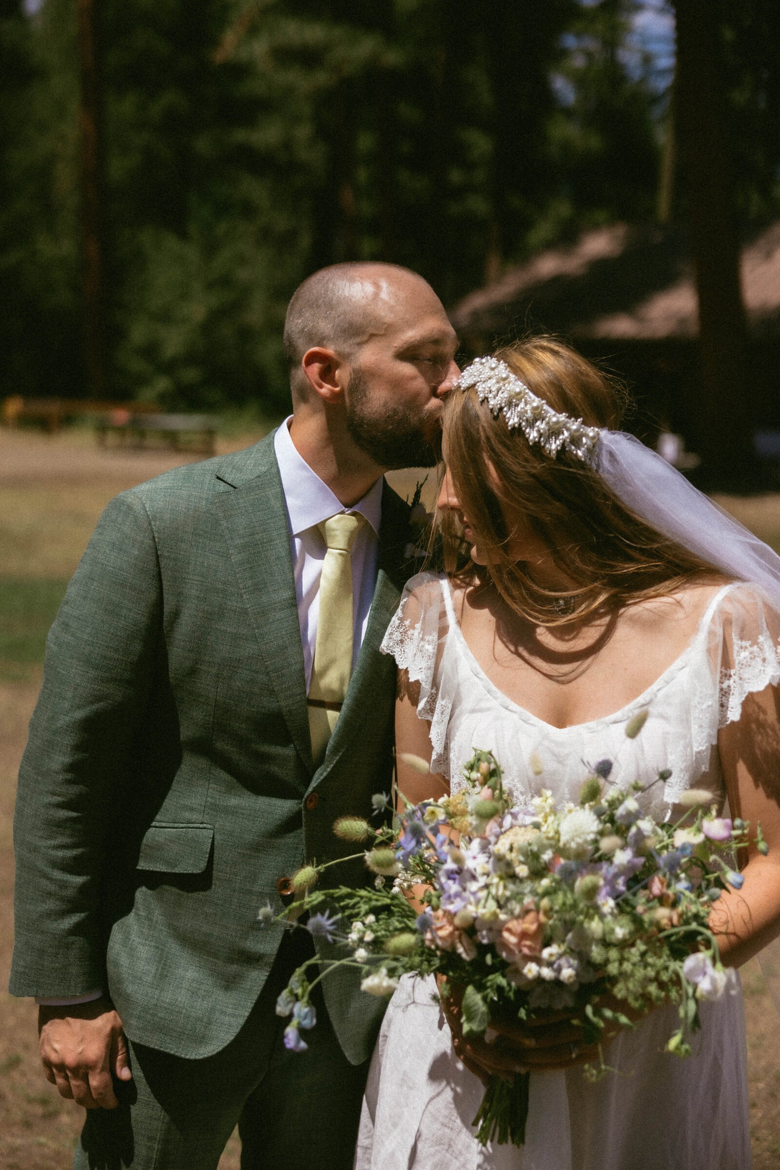 Cinematic bride and groom photo at a spring wedding