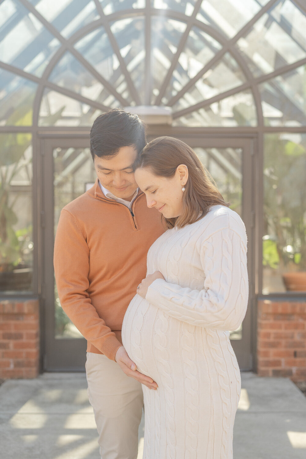 expecting parents filled with excitement during Reston, VA maternity photos