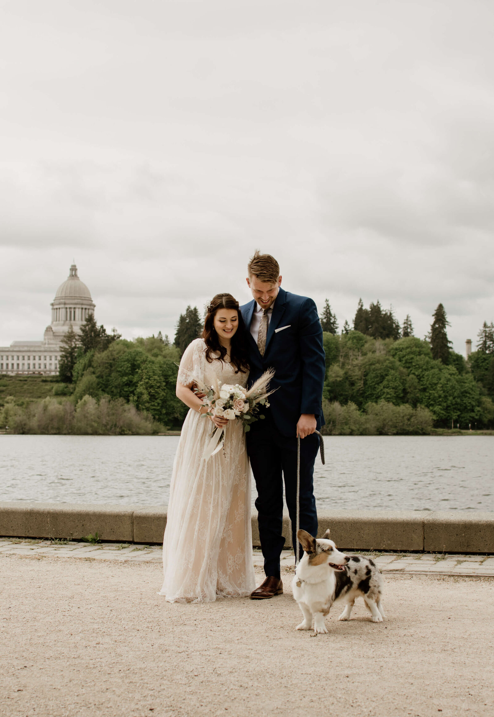 Bride and Groom with their dog.