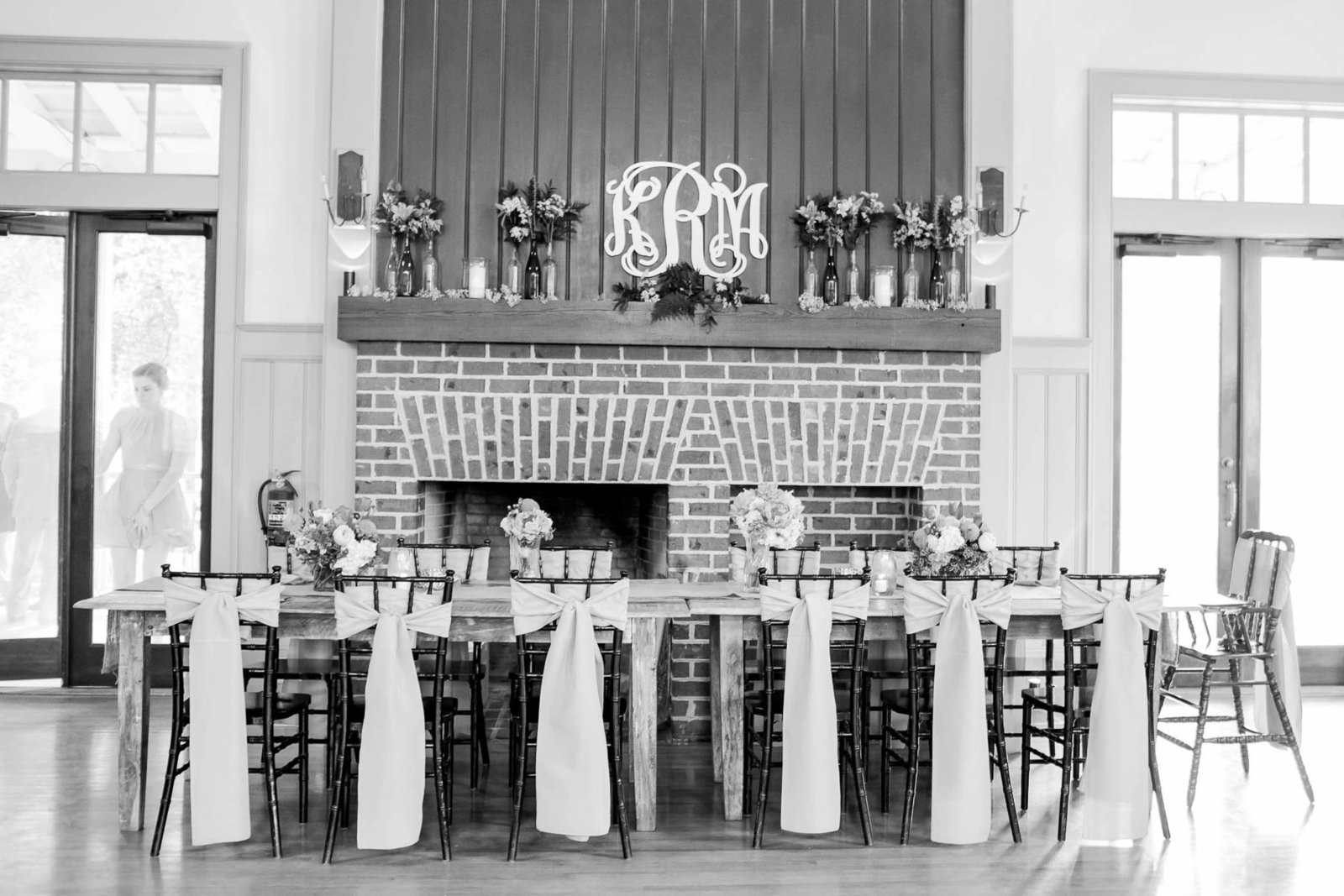 Insignia of bride and groom are placed on the mantle, I'on Creek Club, Mt Pleasant, South Carolina