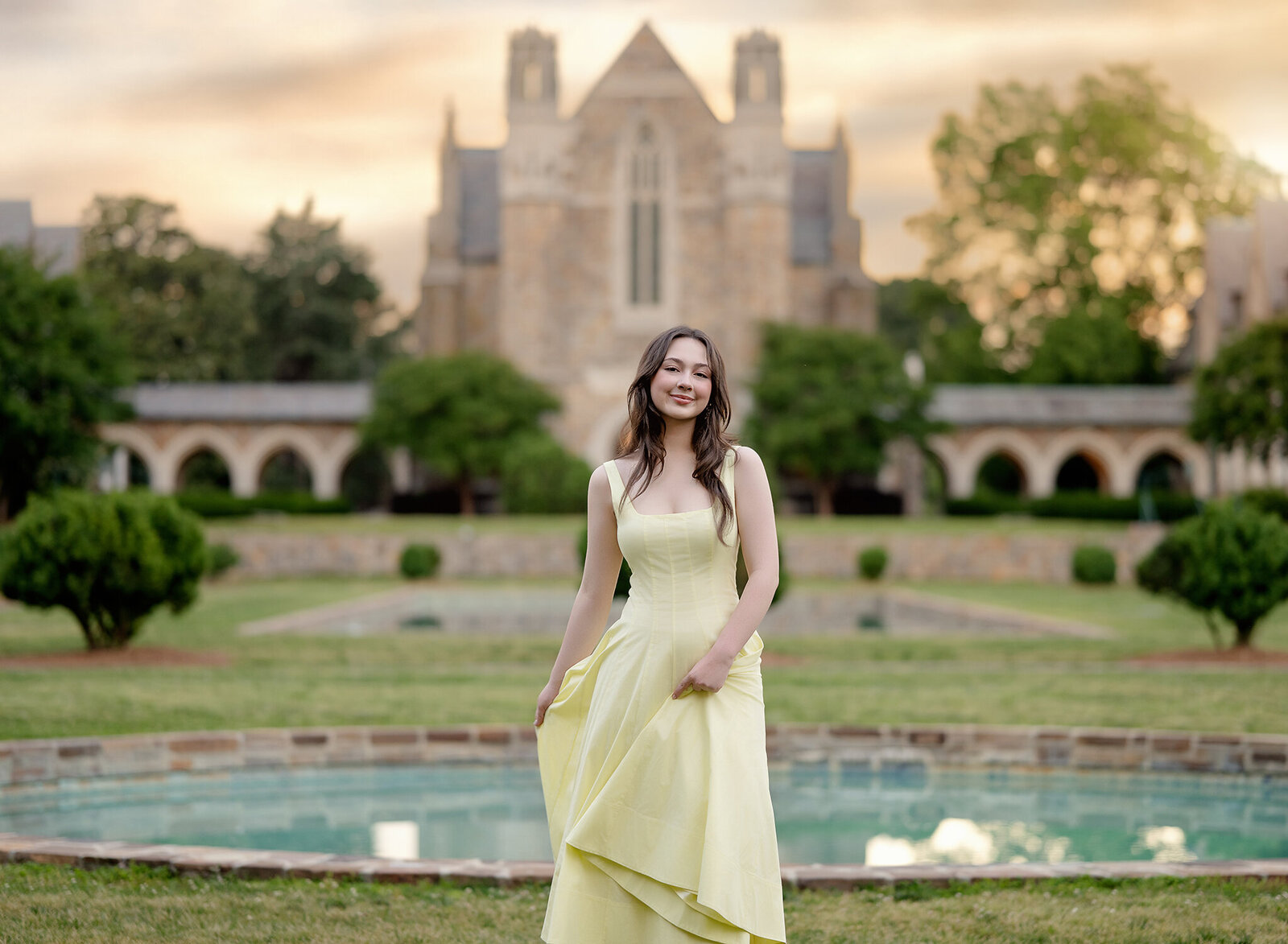 Girl in yellow dress walking at Berry College campus, near Atlanta, GA.