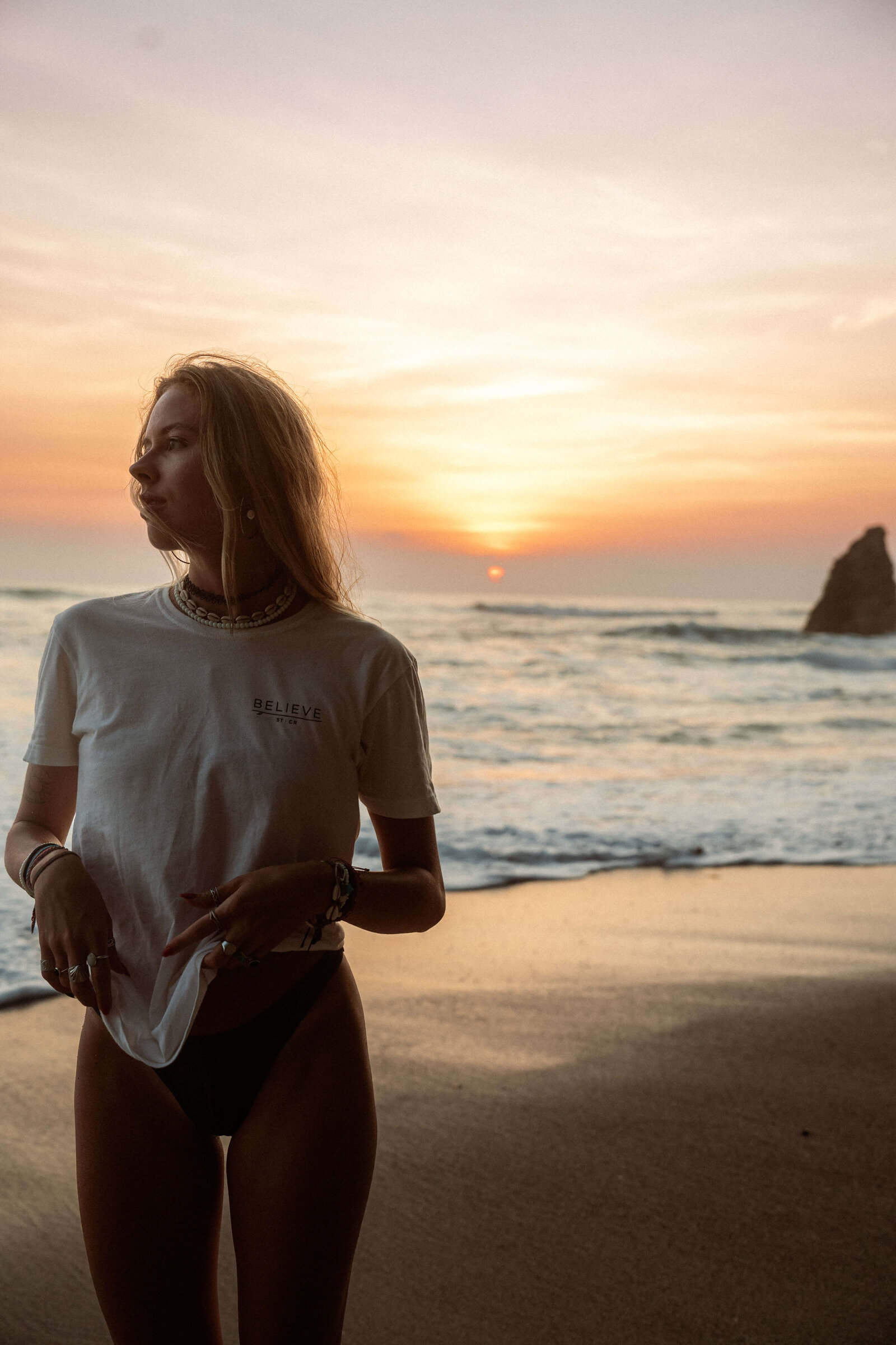 Girl on beach during sunset