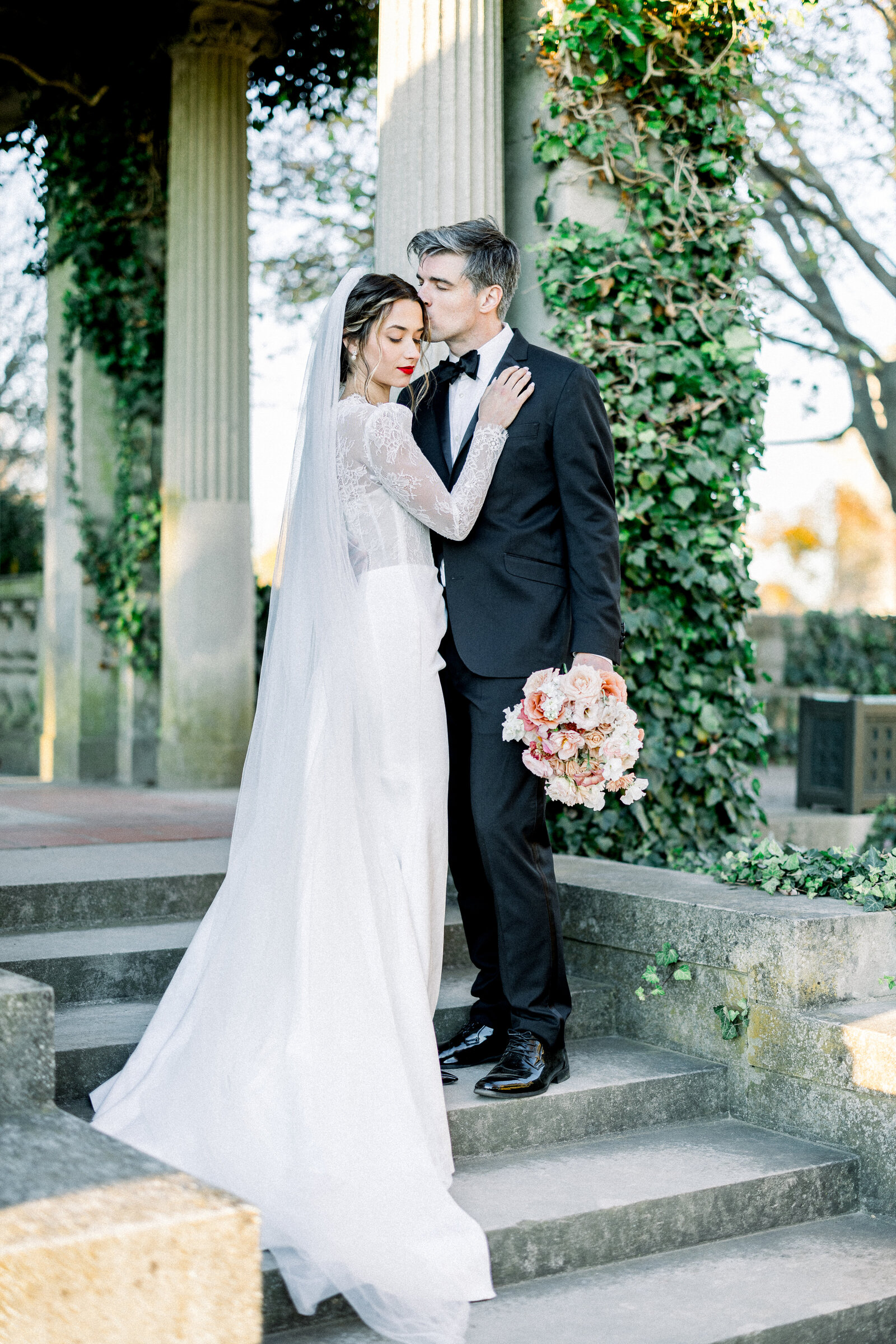 bride and groom pose at eolia mansion at harkness park, coastal estate