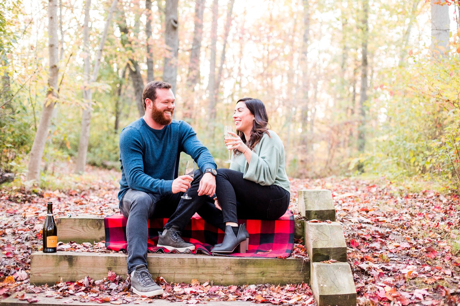 fall engagement with champagne
