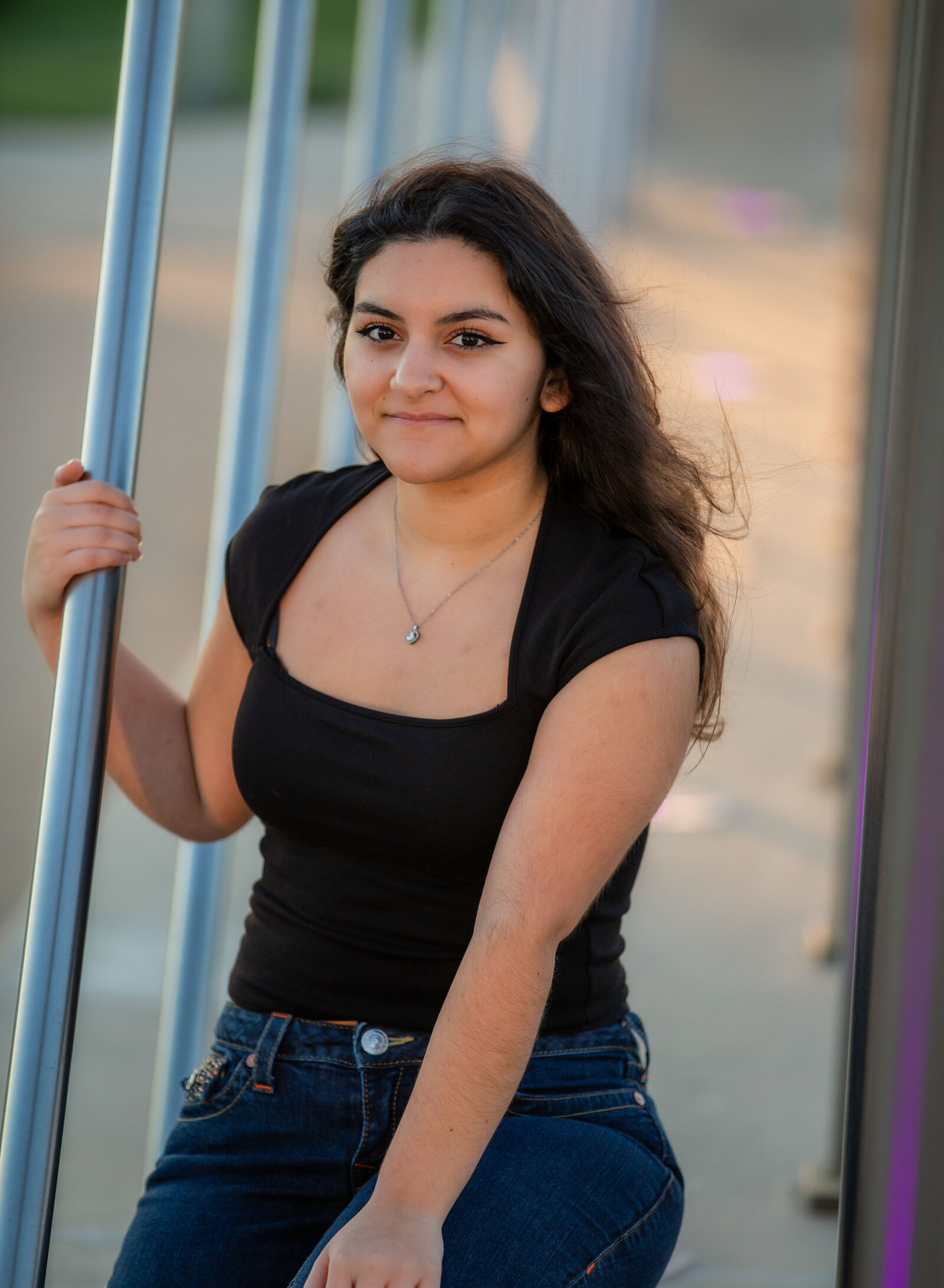 senior girl on West 7th street bridge