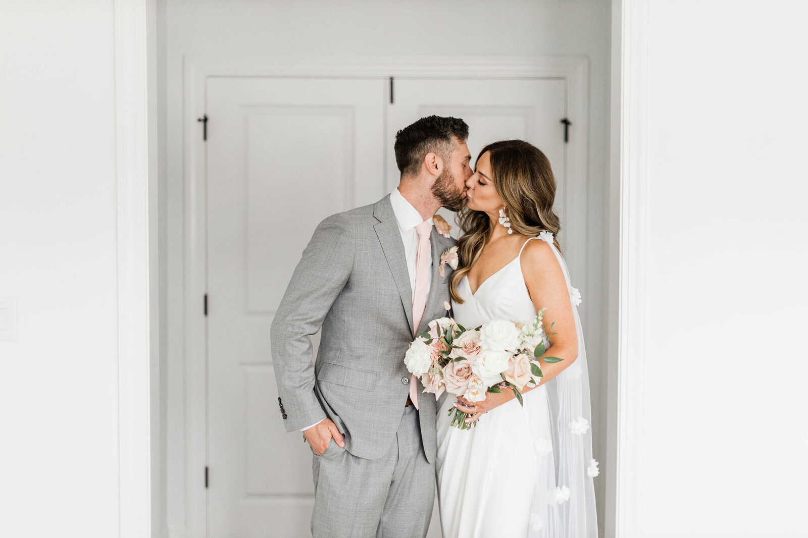Kissing Wedding Photo | Raleigh NC | The Axtells Photo and Film