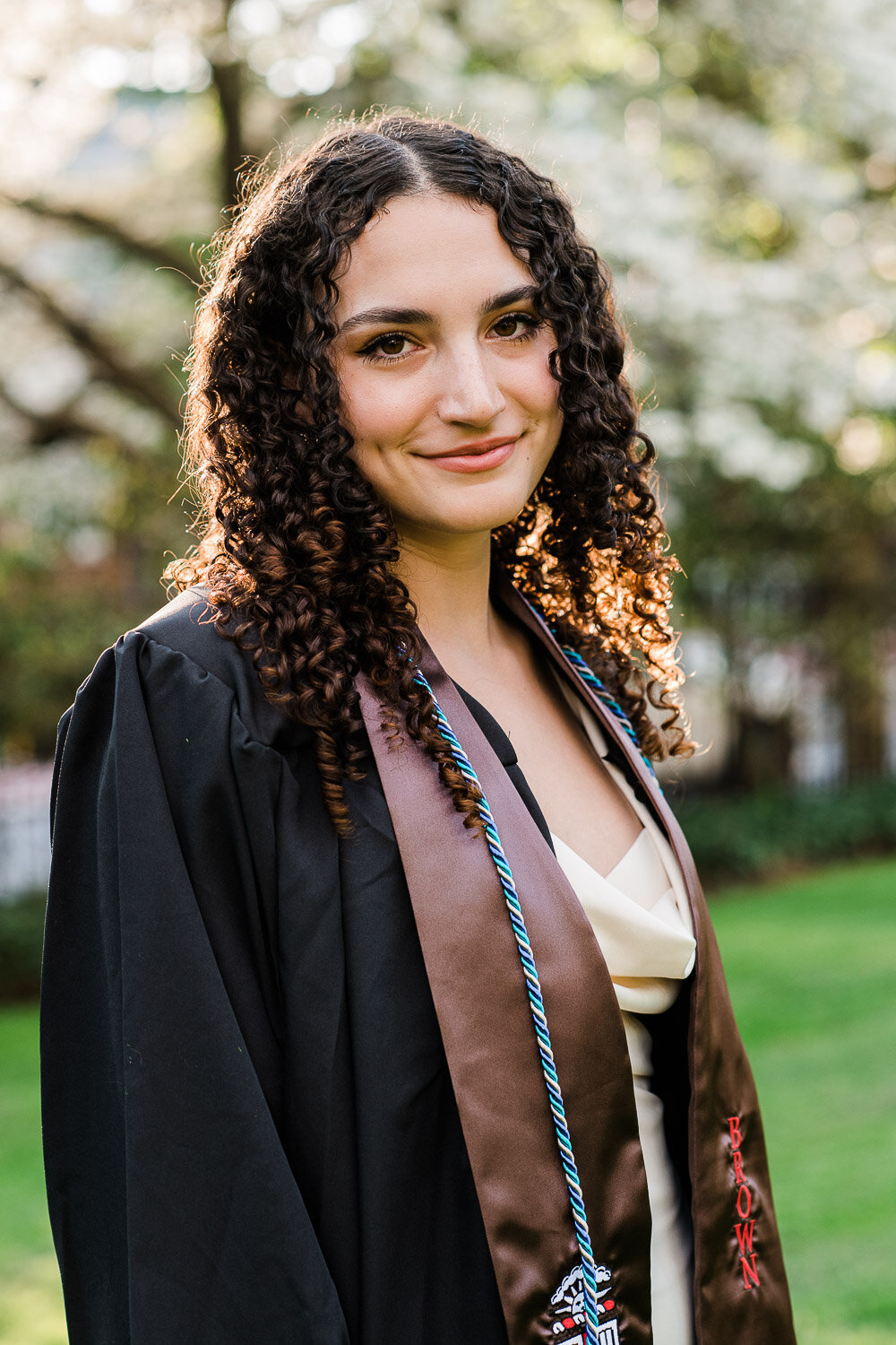 grad girl with robe and sash