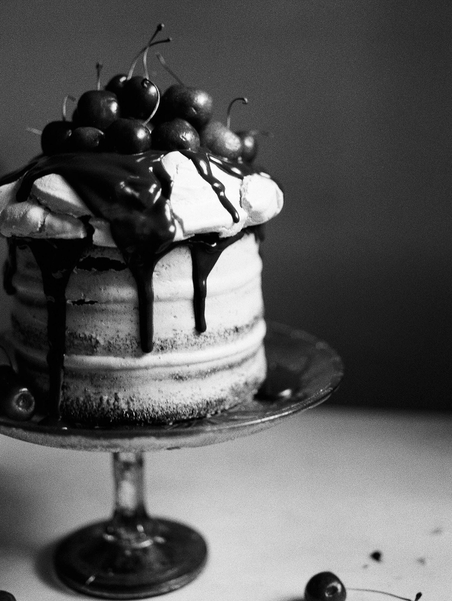 luxury wedding desert topped with fruit and chocolate fudge 