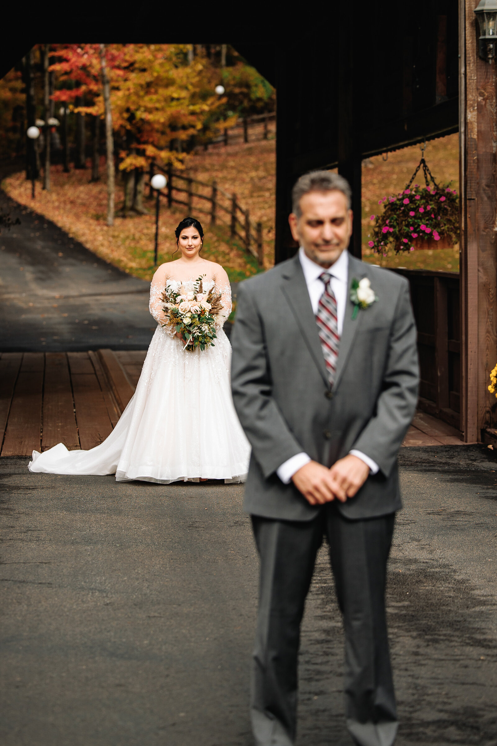 Father eagerly awaits a first  look at his daugter on her wedding day