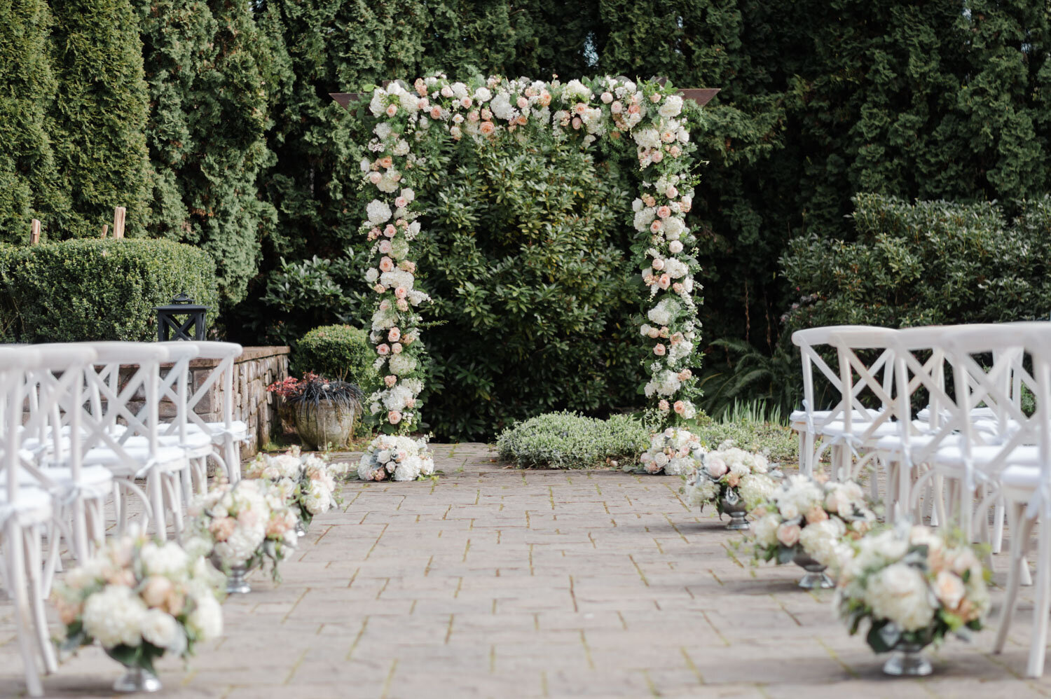 Ceremony aisle with white florals