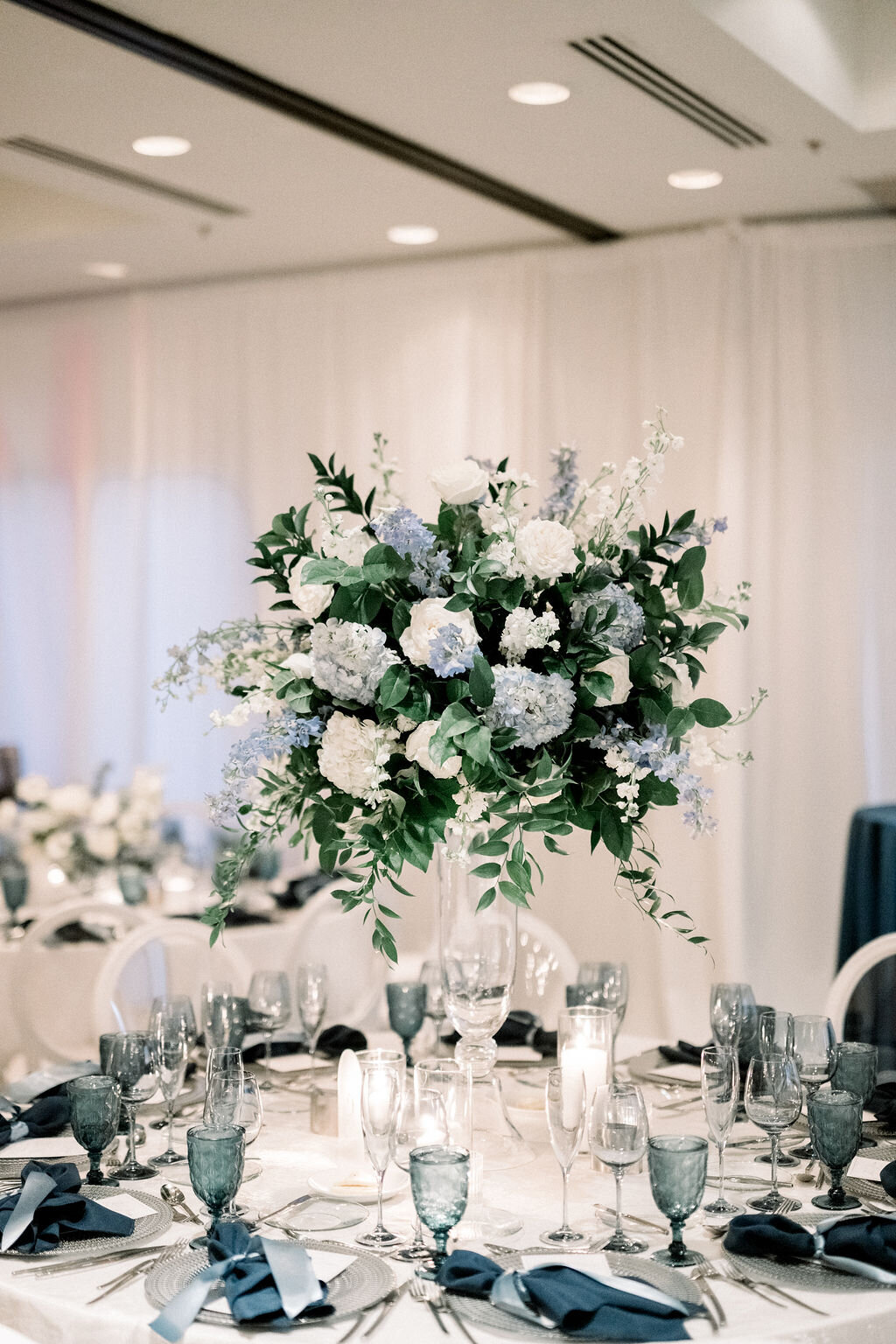 tall-reception-centerpieces-white-blue-flowers-greenery-tempe-florist