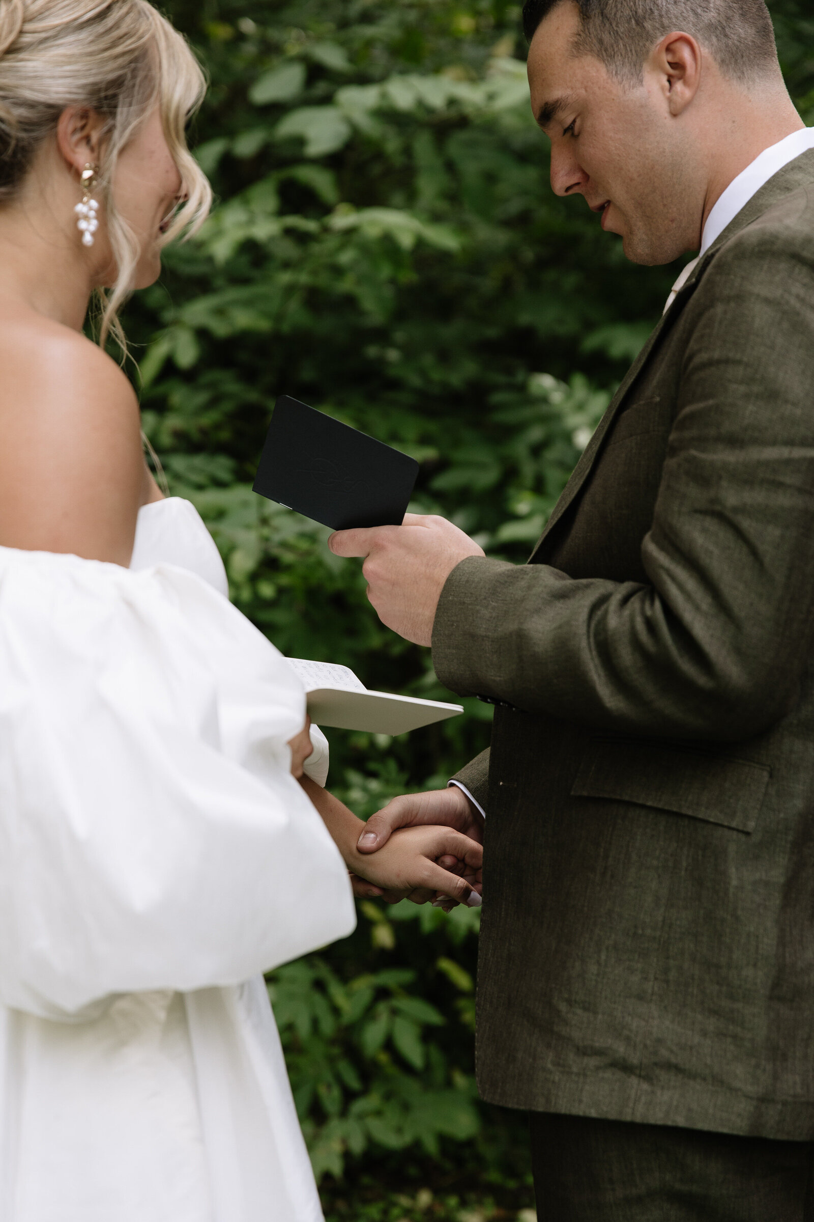 Misty tree-lined ceremony in the Washington woods during fall elopement