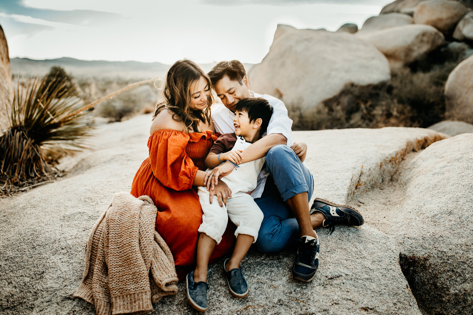 untitled-201024-890-EditFamily-Session-Joshua-Tree-snuggling-together-boy-laughing