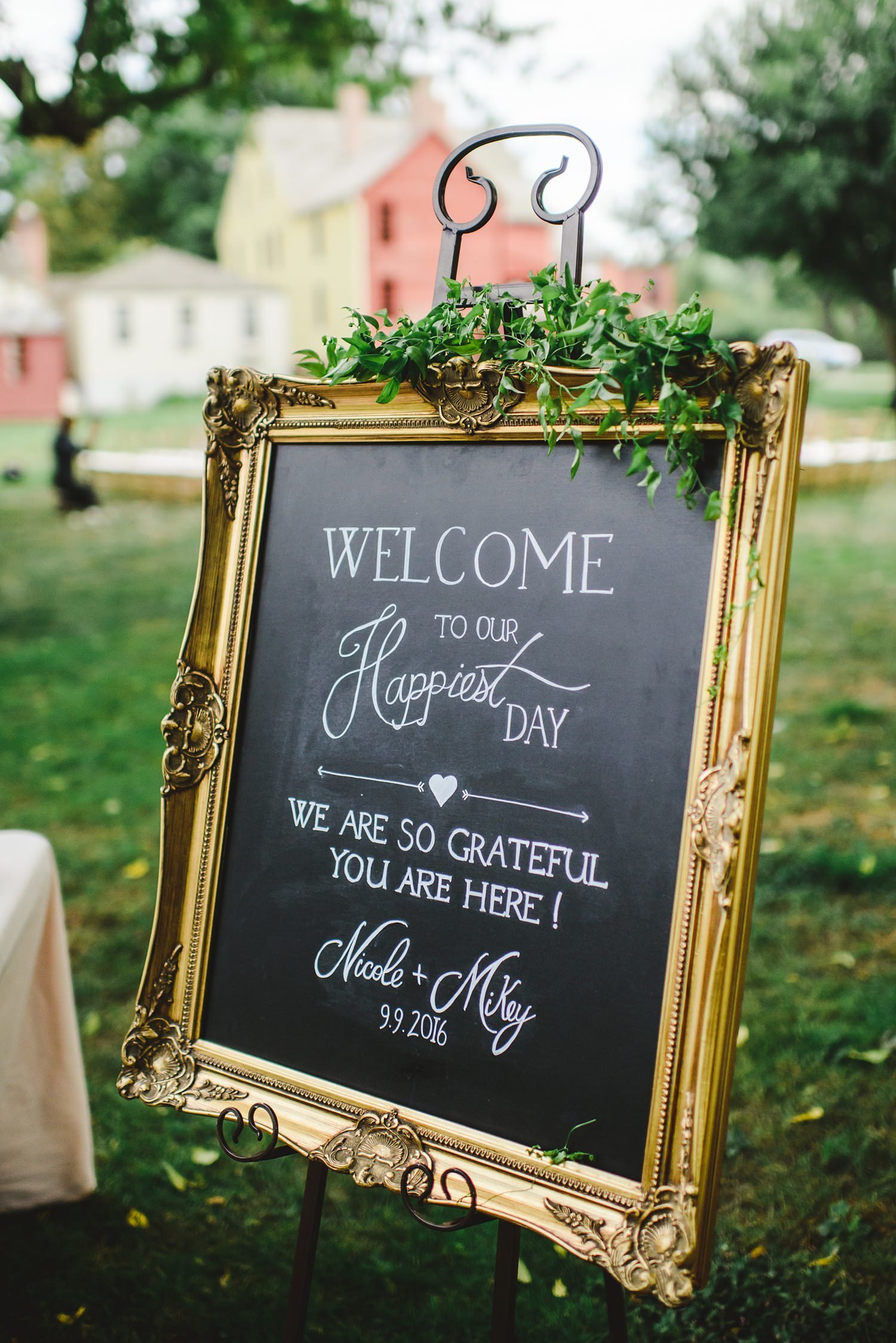 Chalkboard welcome sign in gold frame for wedding at The Webb Barn in Wethersfield, CT