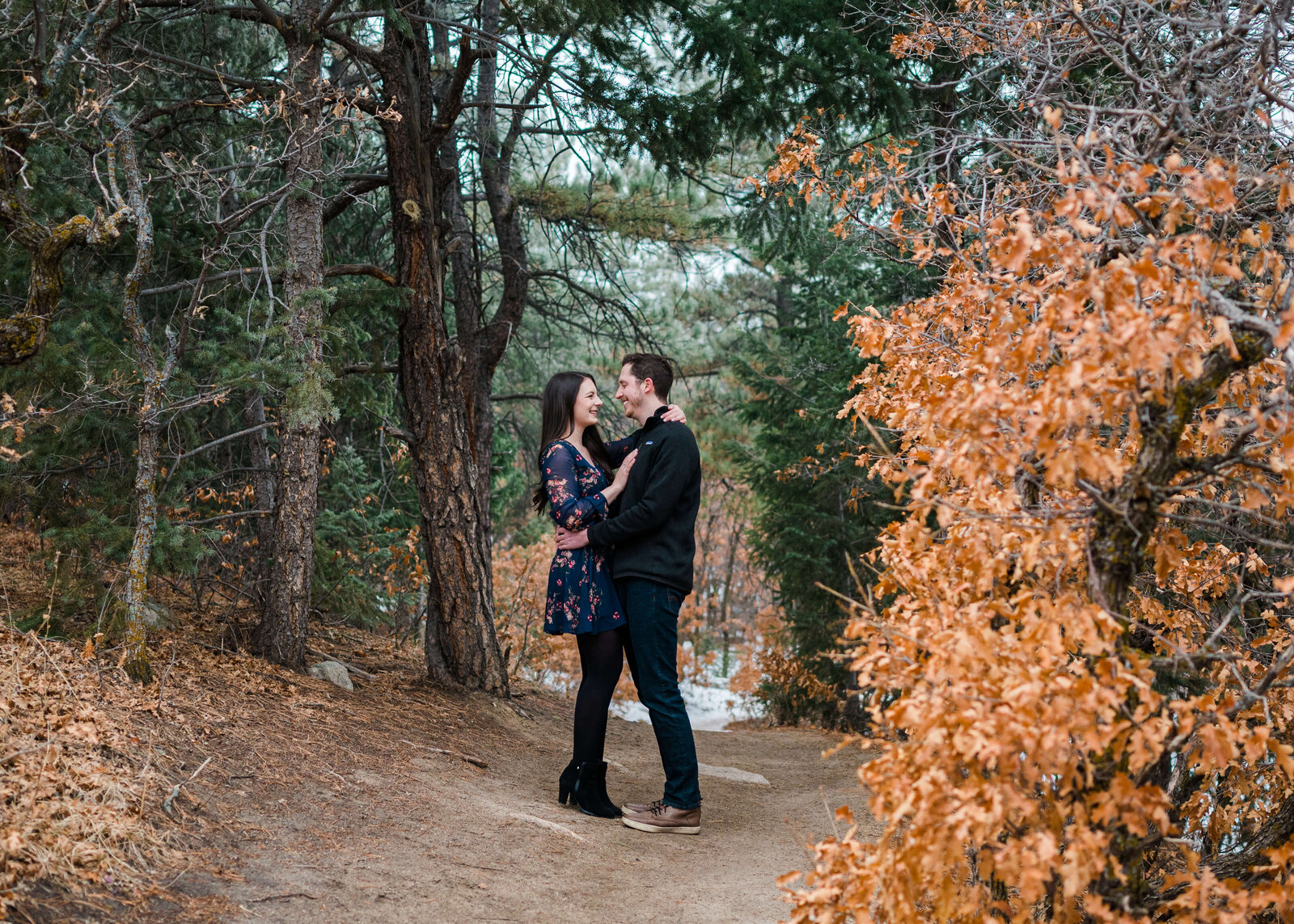 outdoor engagement session with colorful trees