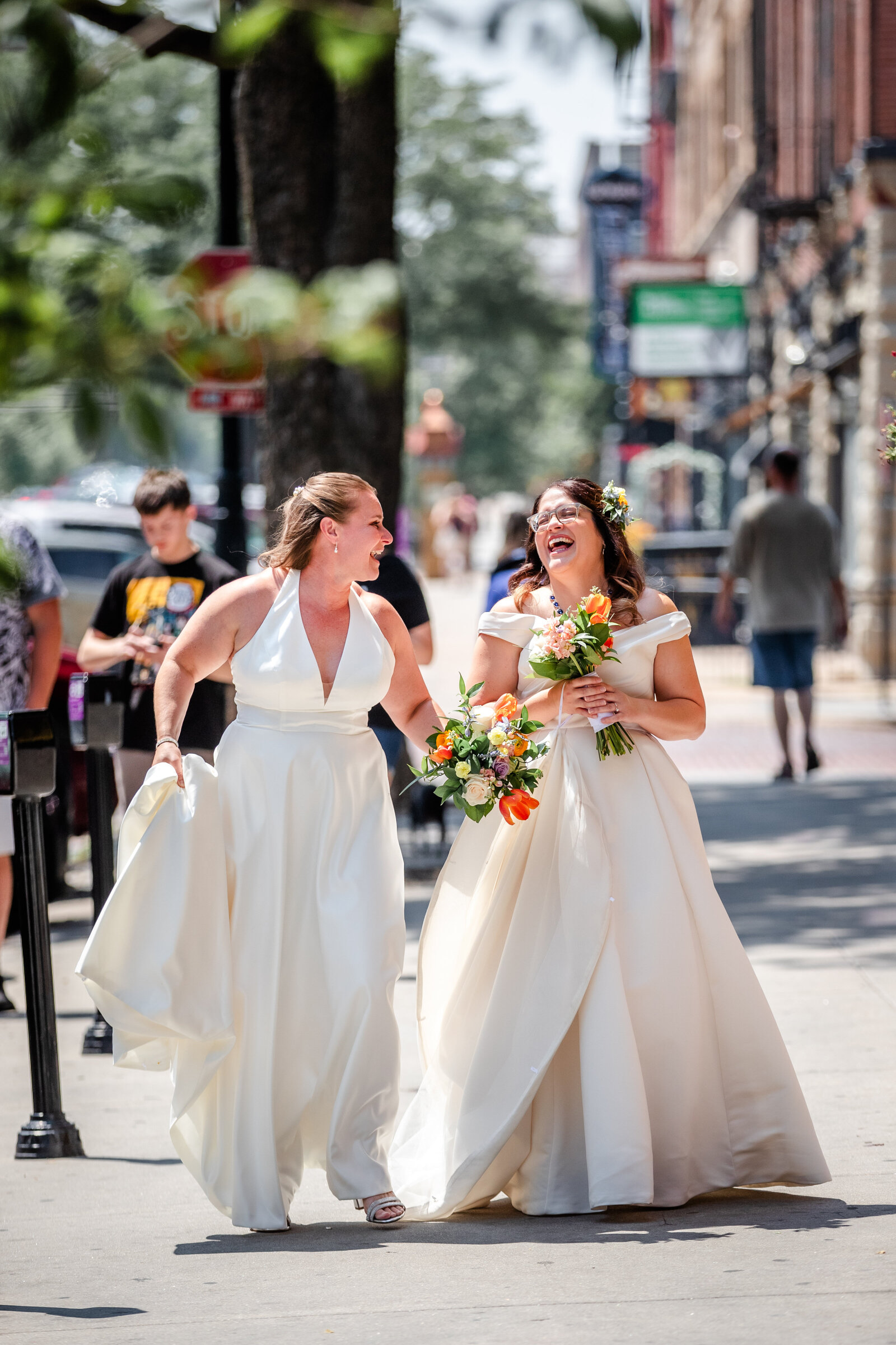 Bride and Bride walking down the Old Market in Omaha Ne