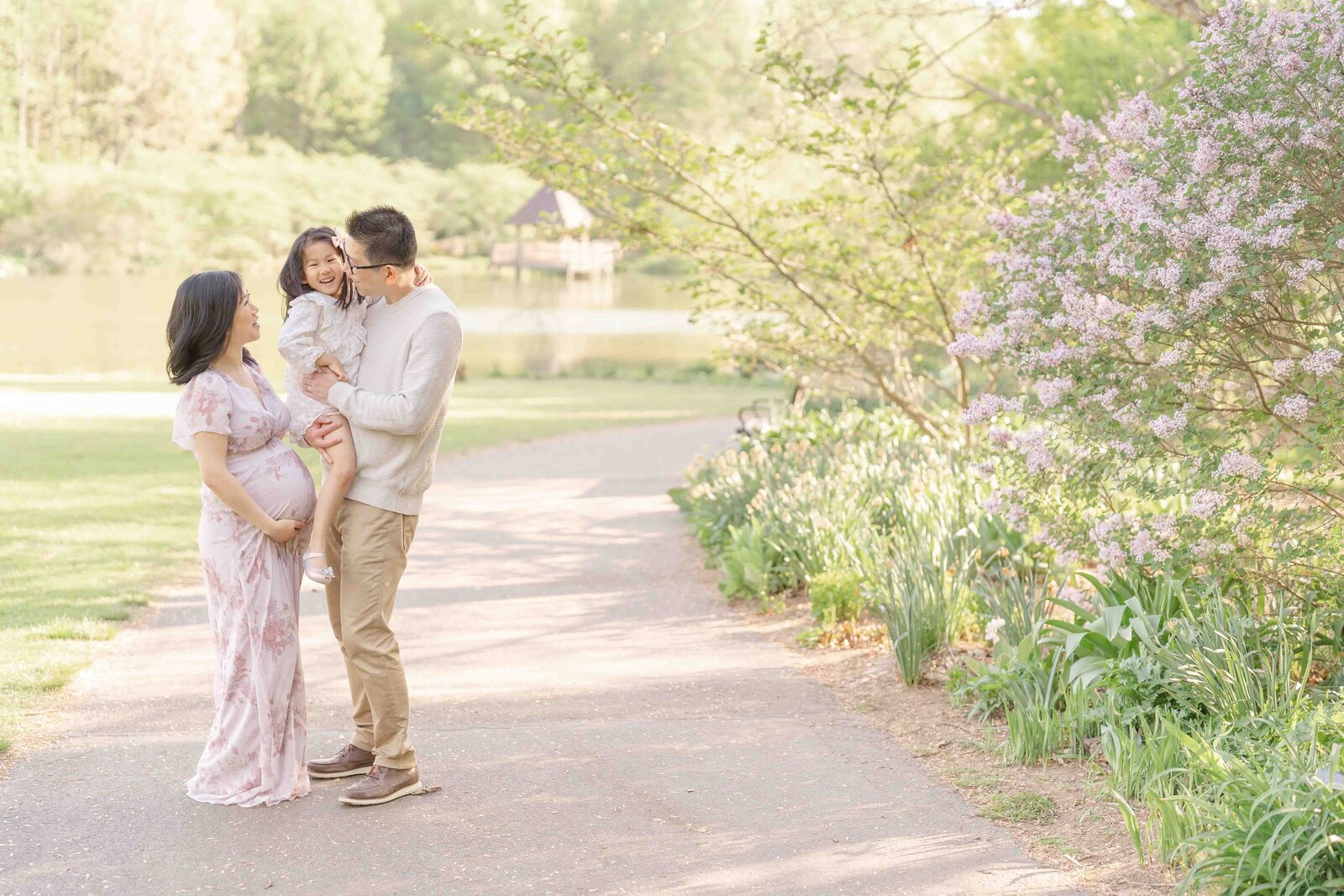 family laughing taken by maternity photographer in Loudoun County, VA
