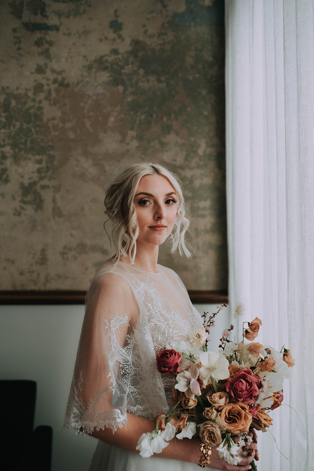 bride in elegant vintage gown