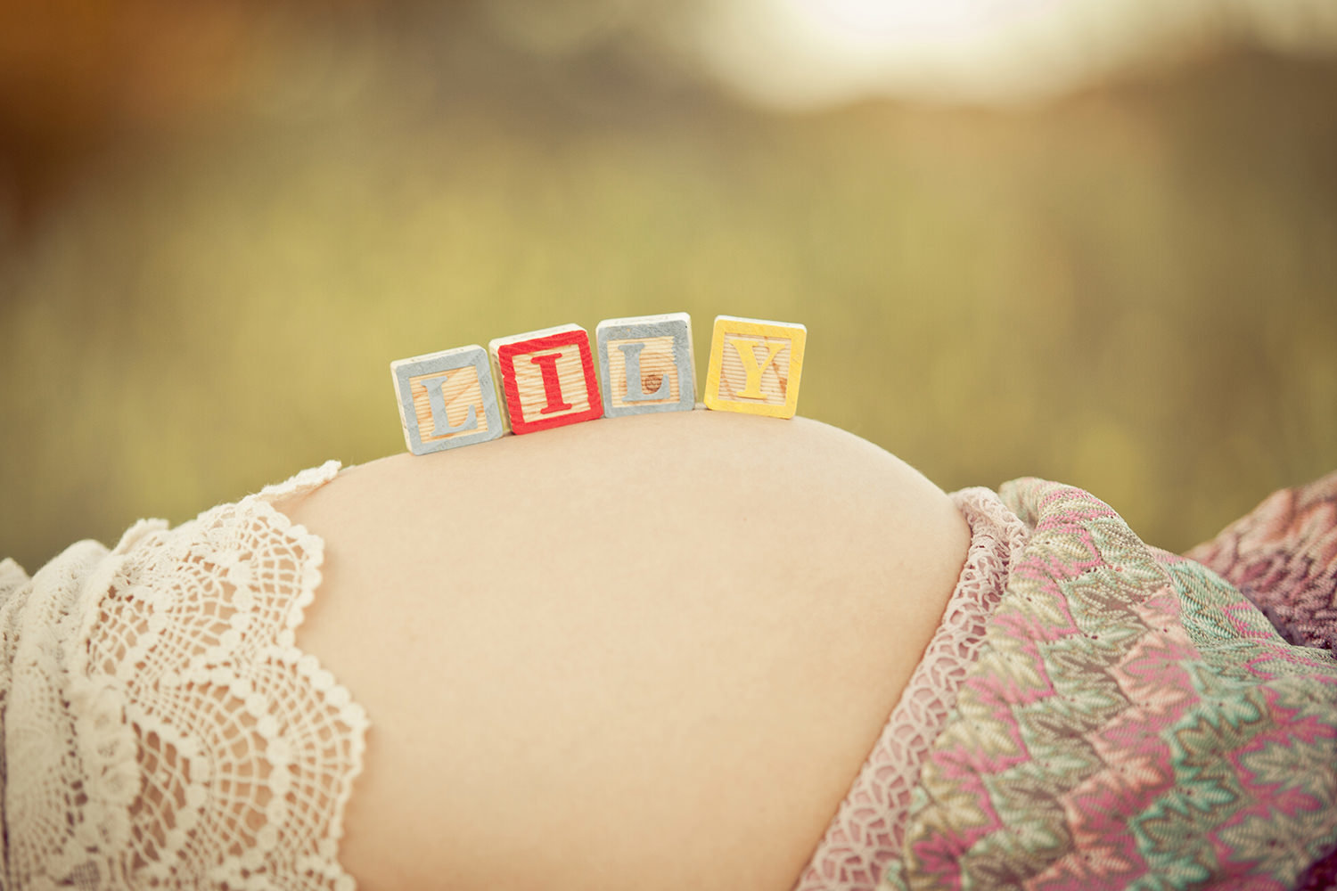 Adorable baby blocks spells out baby’s name during this San Diego Maternity Session.
