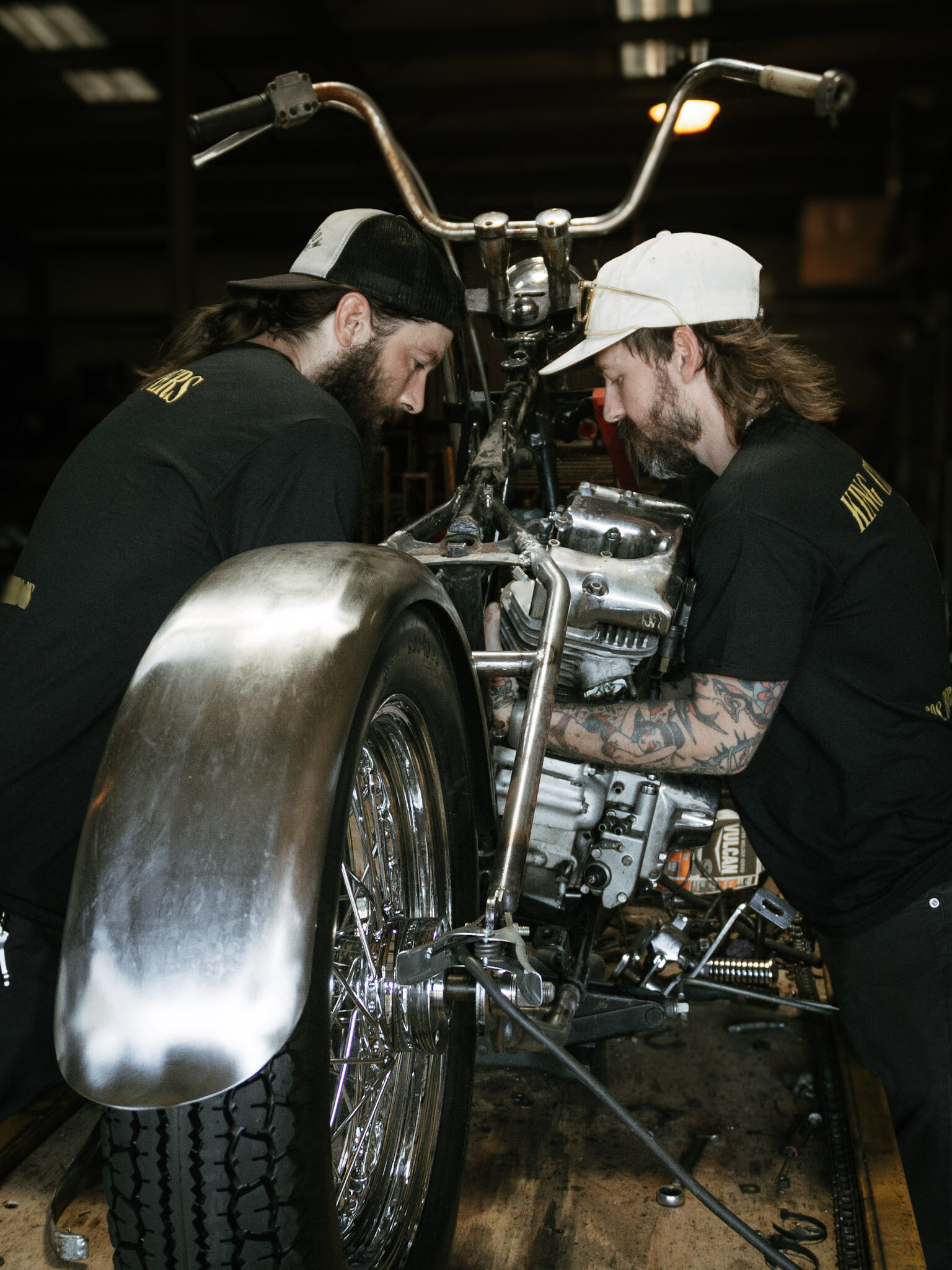 King City Choppers tech pulling a shovelhead engine out.
