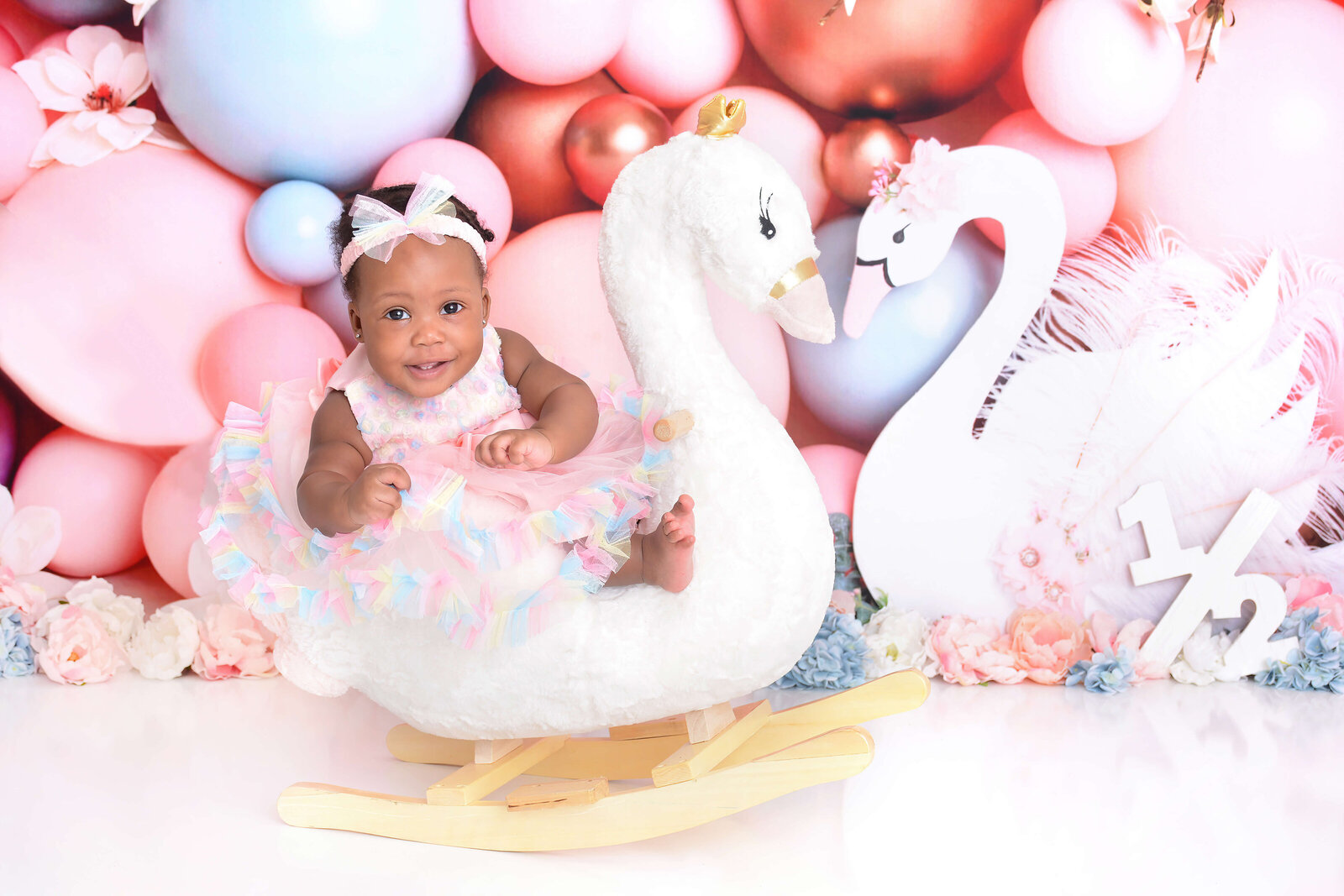 girl at 1/2 birthday photoshoot