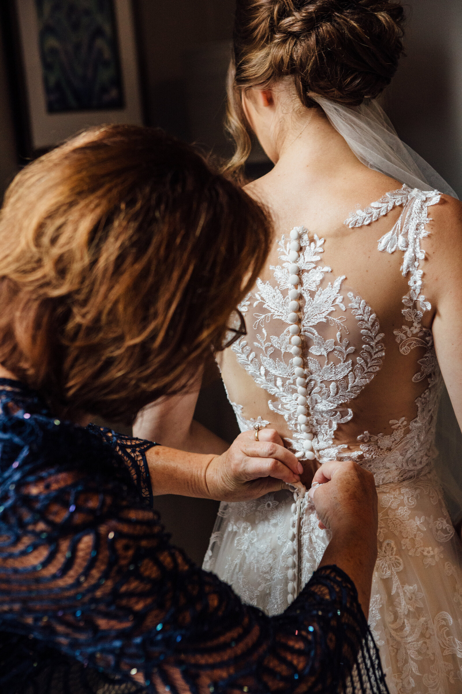 Buttons on brides dress