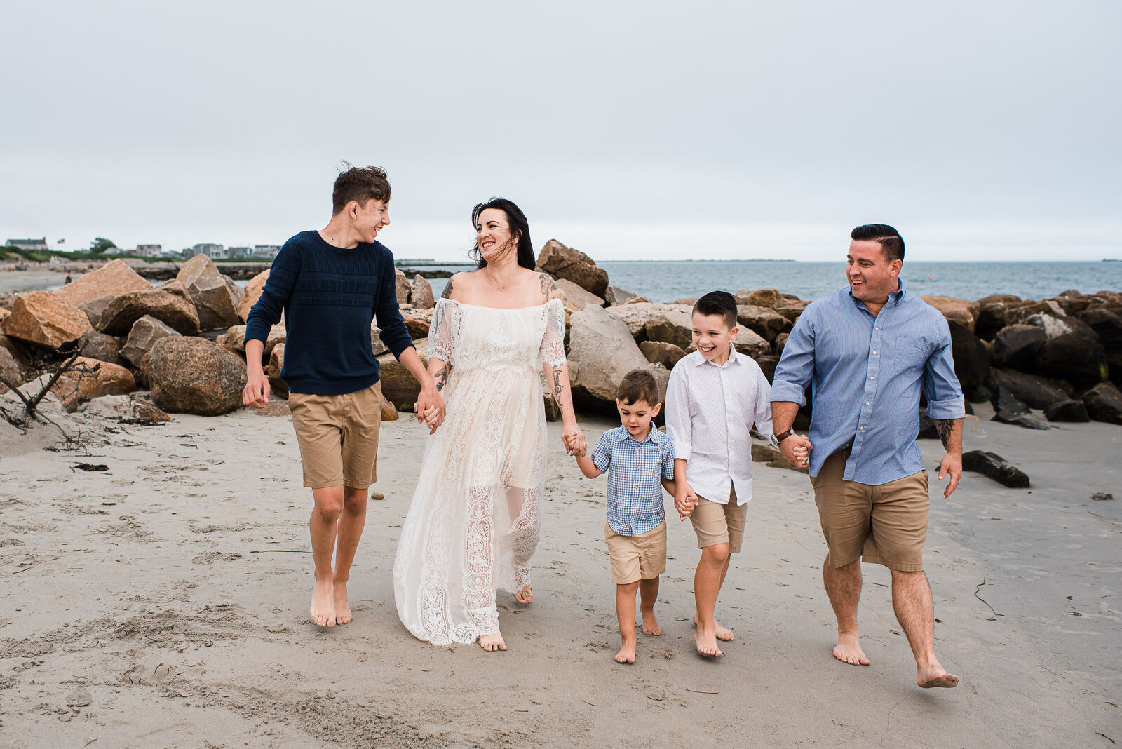 family walks on beach